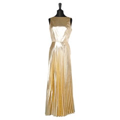 Long evening dress in gold lurex sunary pleats Anna Vietto Circa 1960