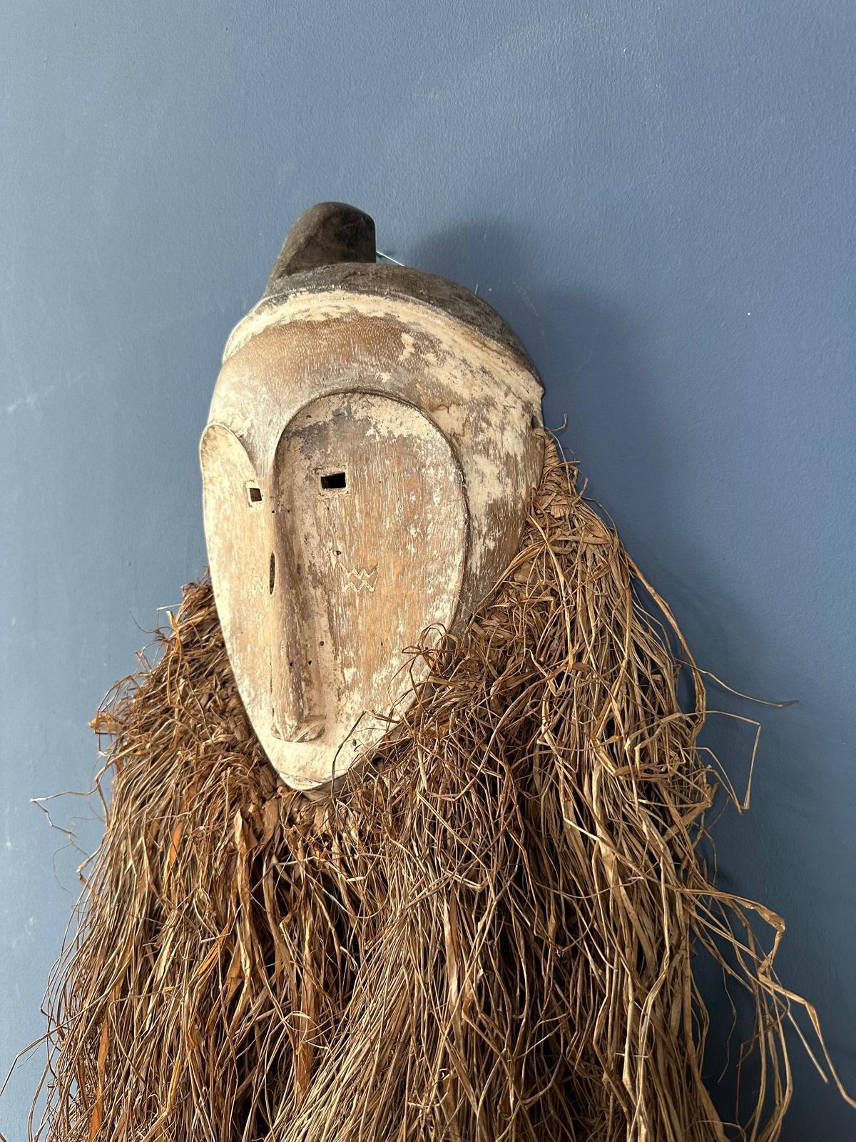 19th Century Long face tribal mask with narrow eye-holes For Sale