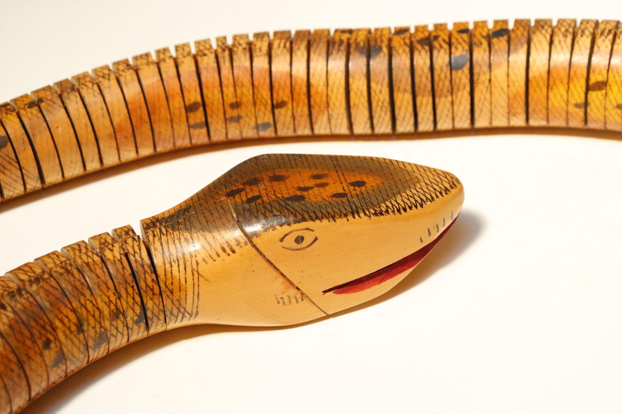 Long Folk Art Articulated Flexible Carved and Hand-Painted Snake Sculpture For Sale 5