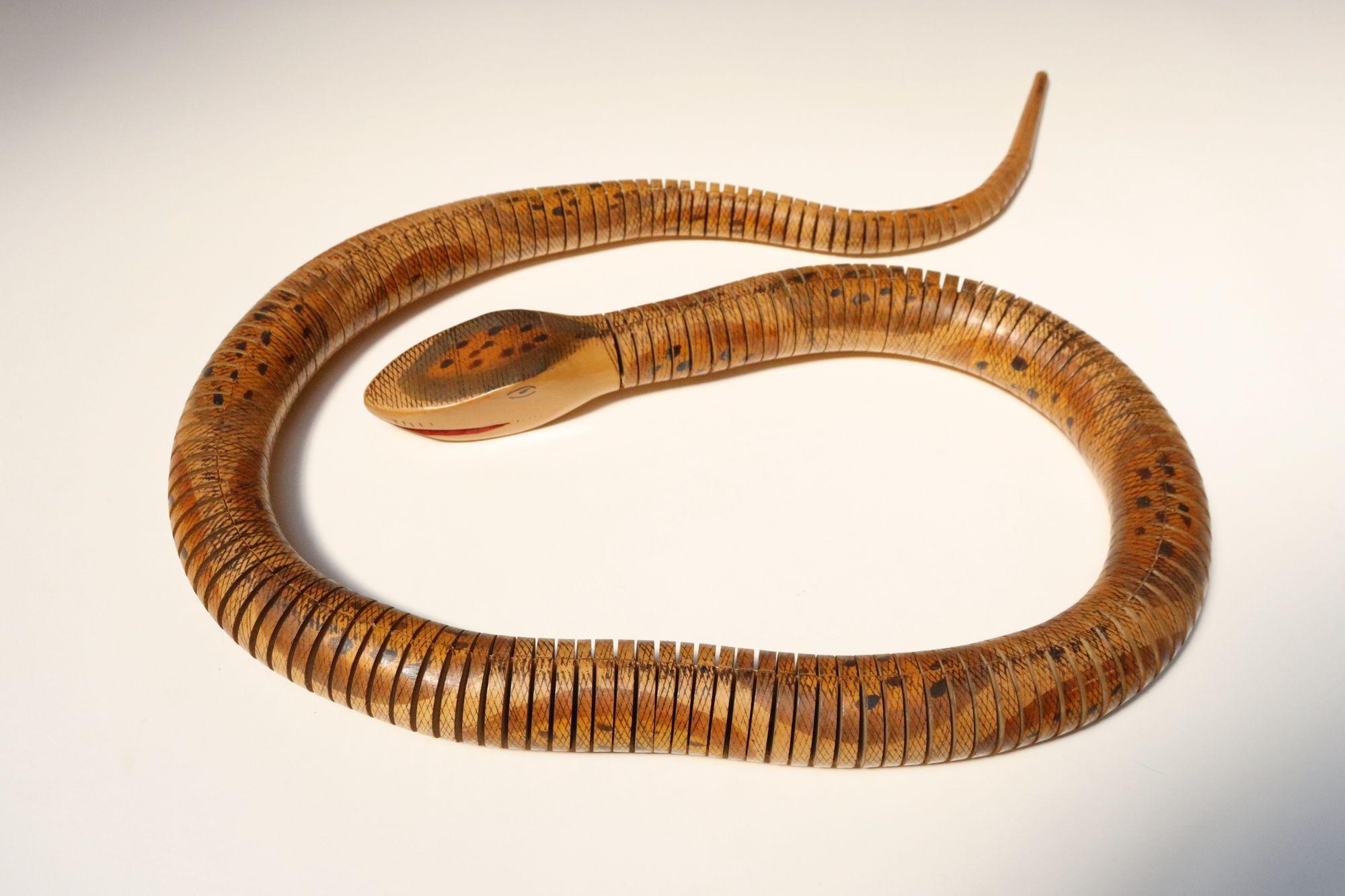 South American Long Folk Art Articulated Flexible Carved and Hand-Painted Snake Sculpture For Sale