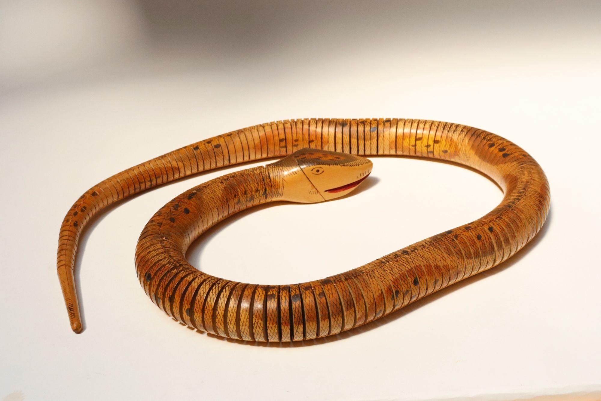Late 20th Century Long Folk Art Articulated Flexible Carved and Hand-Painted Snake Sculpture For Sale