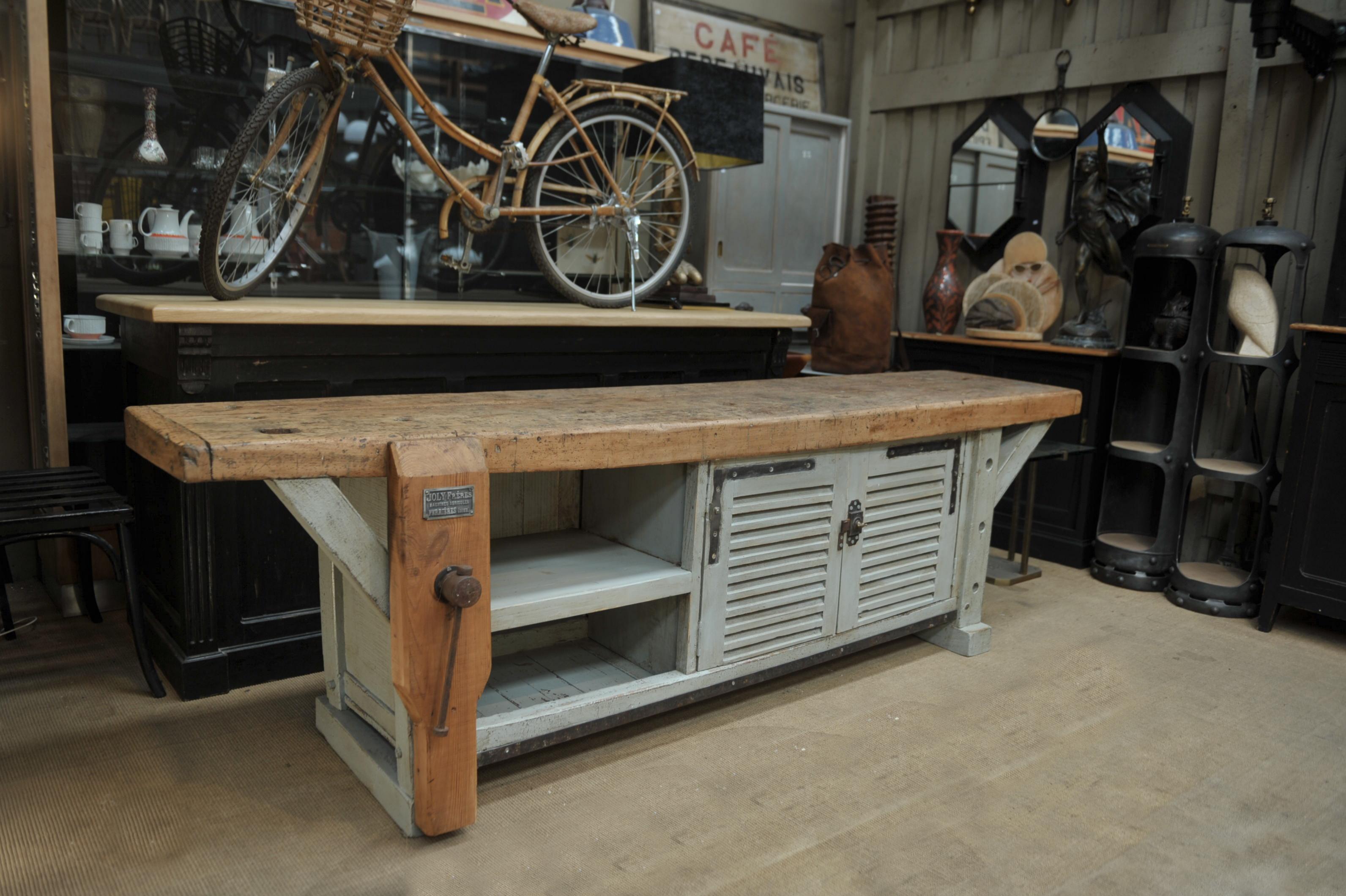 Long pine carpenter work bench cabinet France circa 1930 with vice 2 doors. Depth of the top not including vice: 53 cm