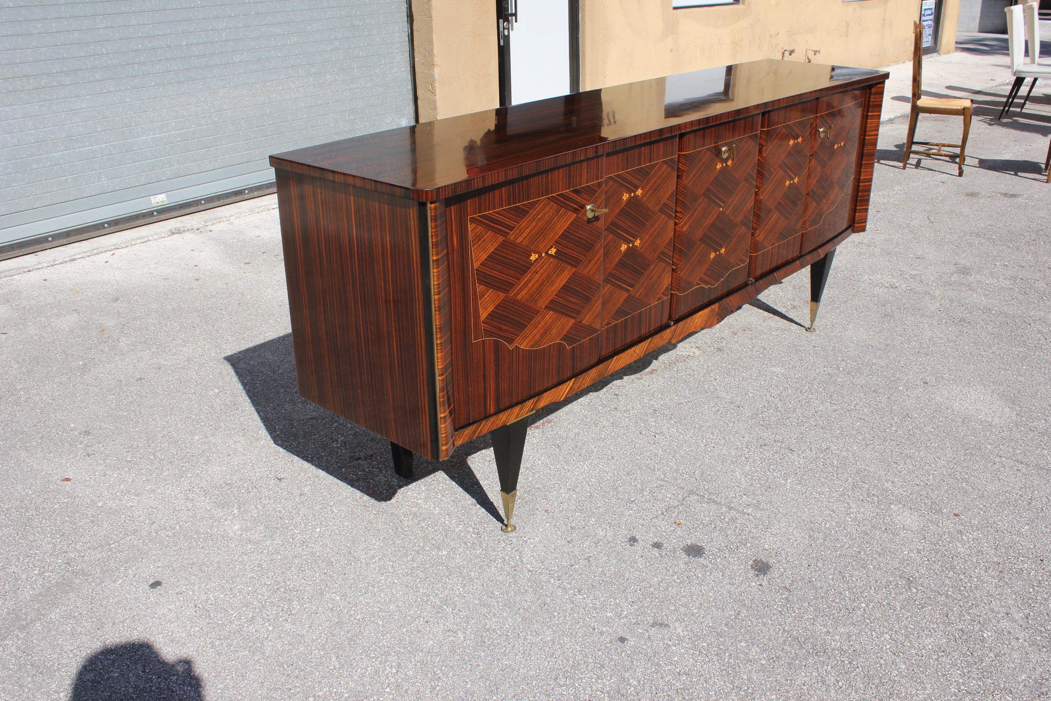 Long French 5 Doors Exotic Macassar Ebony Mother of pearl Sideboard / Buffet / Bar, circa 1940s. The sideboard are in very good condition, With 2 drawers inside, and with 4 shelves adjustable,you can remove all the shelves if you need more Space,