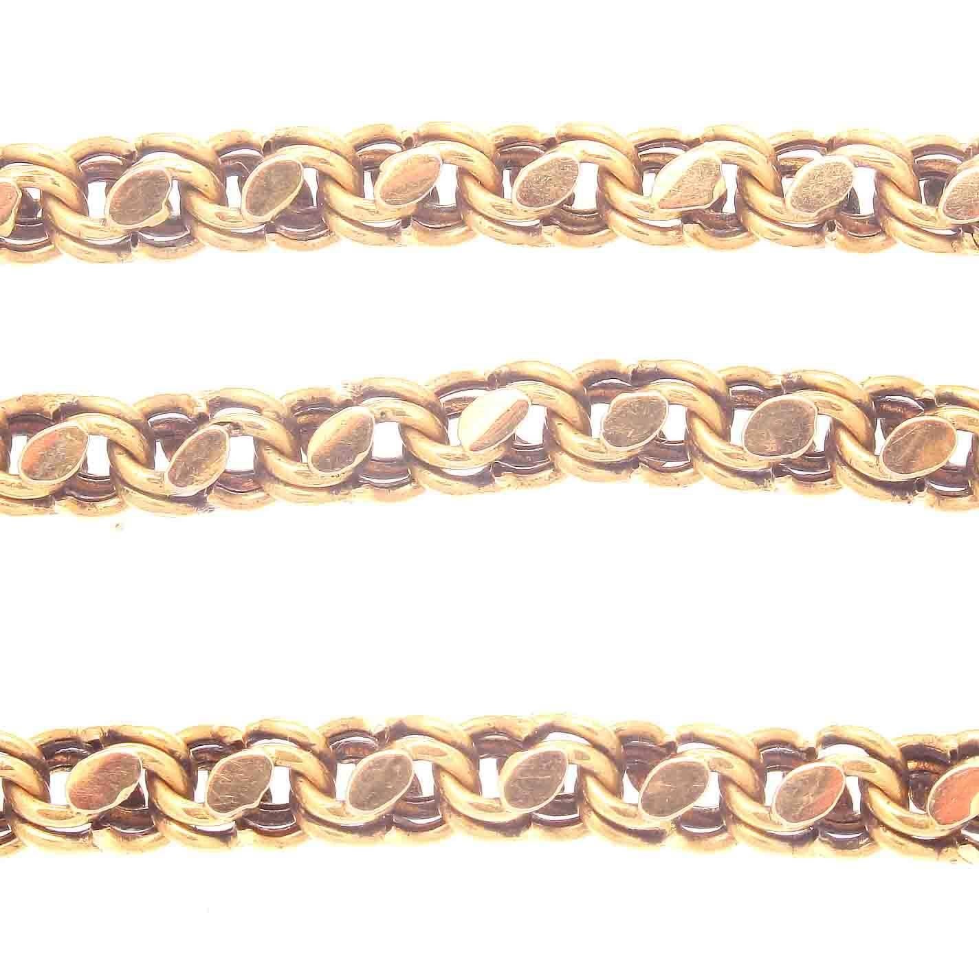 Classic design that allows the wearer flexibility in how it's worn. Long enough to quadruple wrap, triple wrap, double wrap or just wear as a long single chain. Constructed with intricate links of 18k gold interlocking together.  Stamped with French
