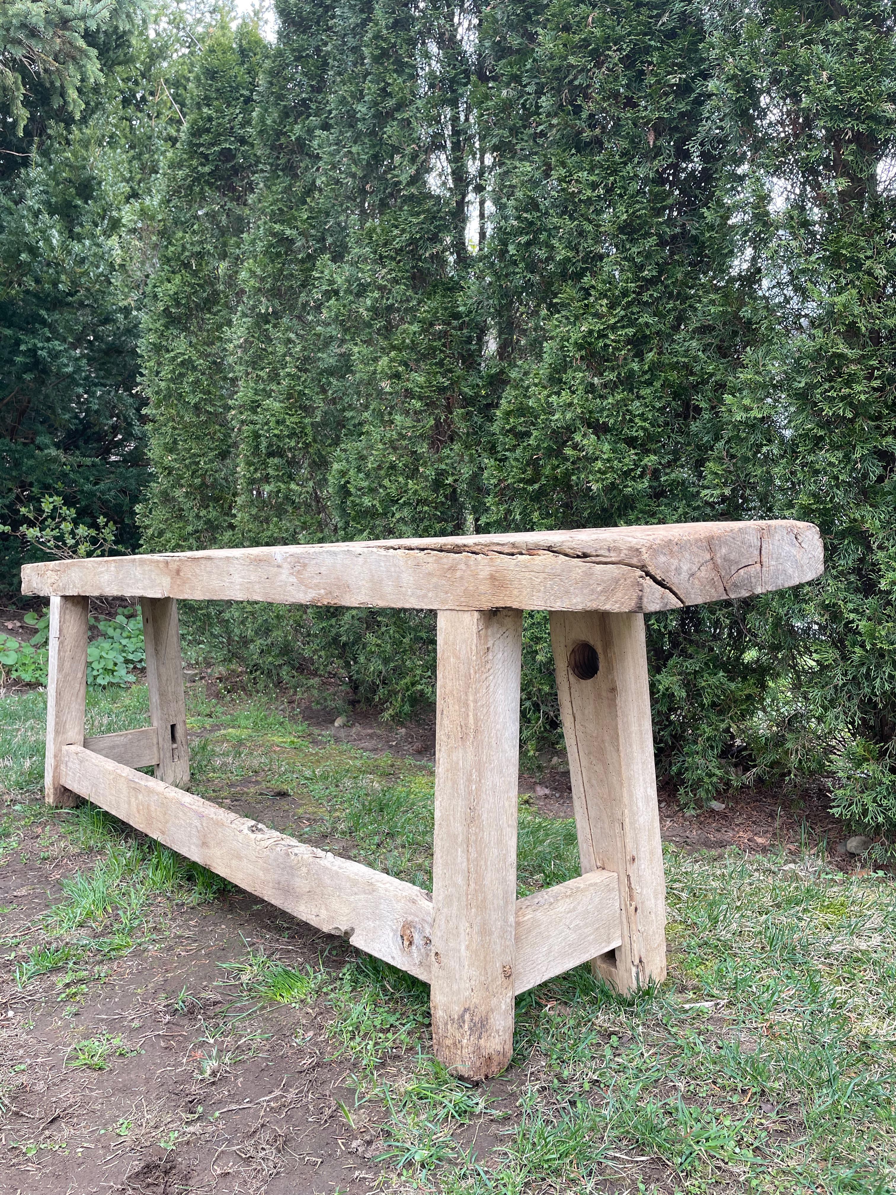 We are always in search of good hand-made primitive tables with a Wabi Sabi feel and this is a beauty. Made of thick French oak and with a lovely light color, it would be stunning in an entrance foyer or as a sofa table. It has a few nibbles to the