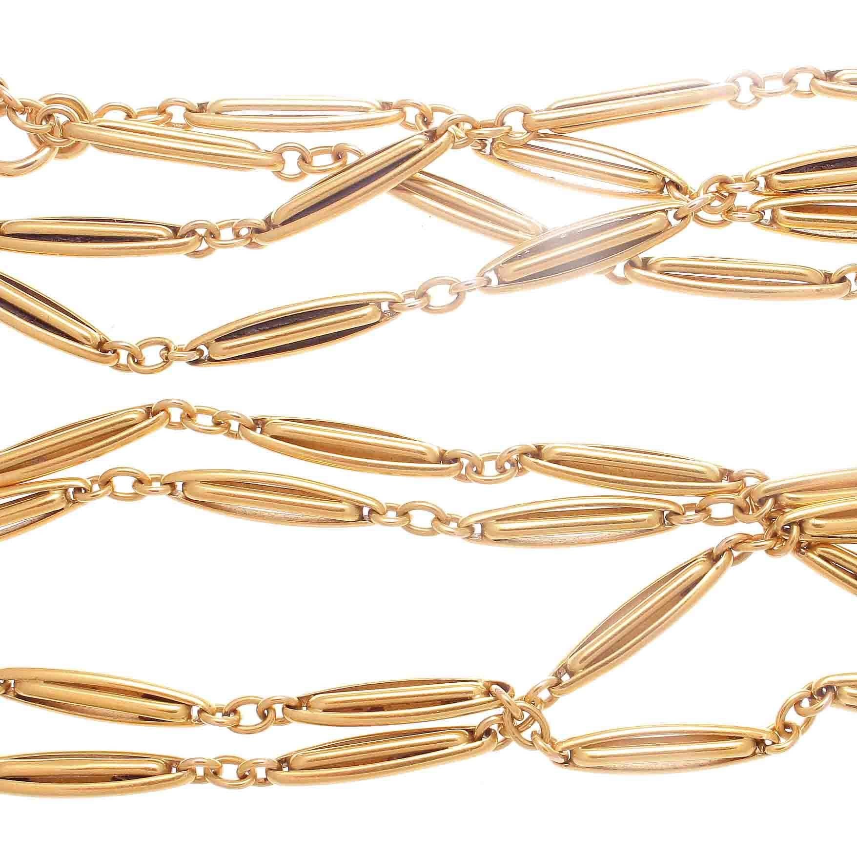 Classic and creative design that allows the wearer flexibility in how it's worn. Long enough to quadruple wrap, triple wrap, double wrap or just wear as a long single chain. Constructed with intricately links of 18k gold interlocking together. 