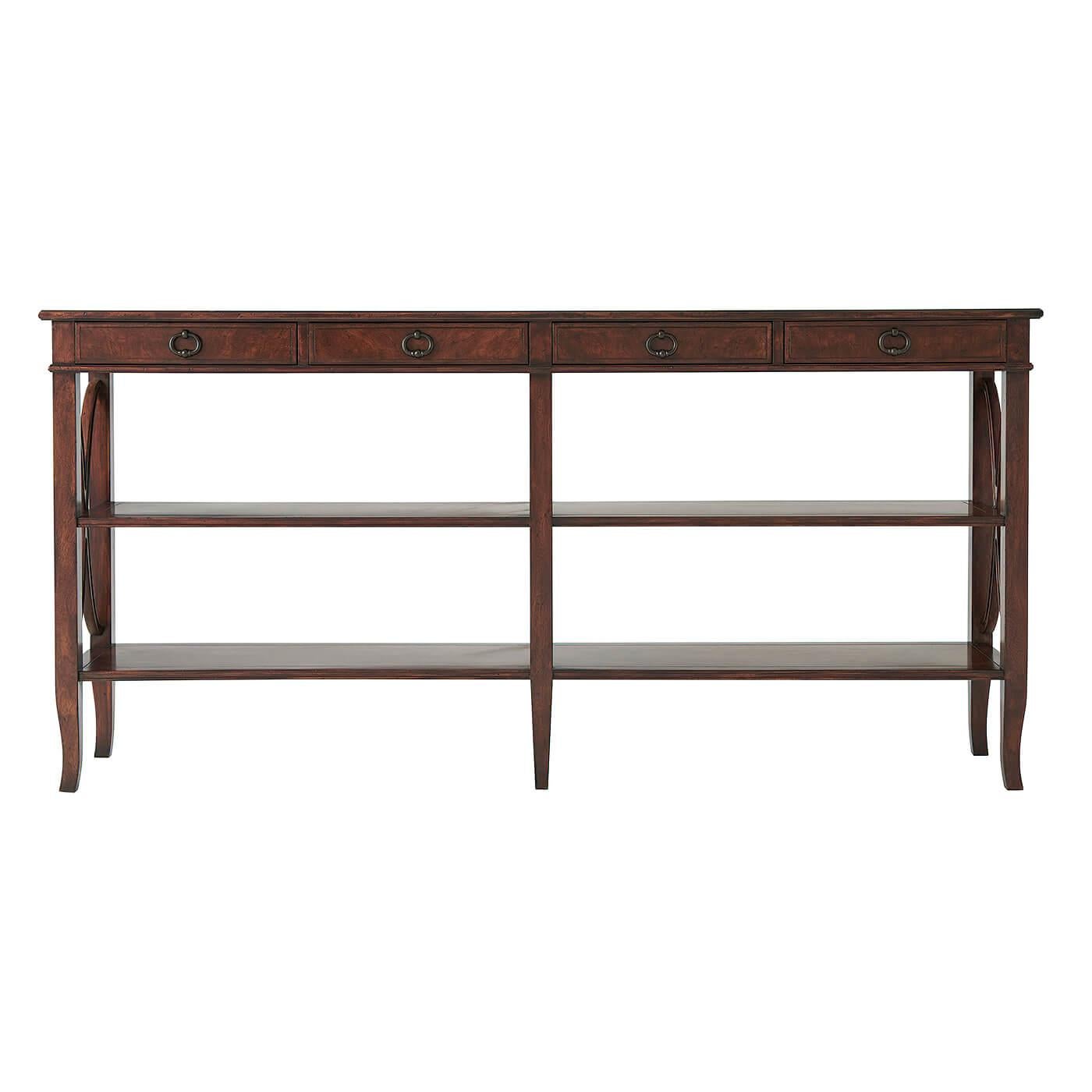 A French Neoclassic style mahogany and cerejeira veneered console table, the rectangular crossbanded and molded edge top above four frieze drawers, on square legs, joined to the sides and in the center by wavy 'X' stretchers and on splayed legs,