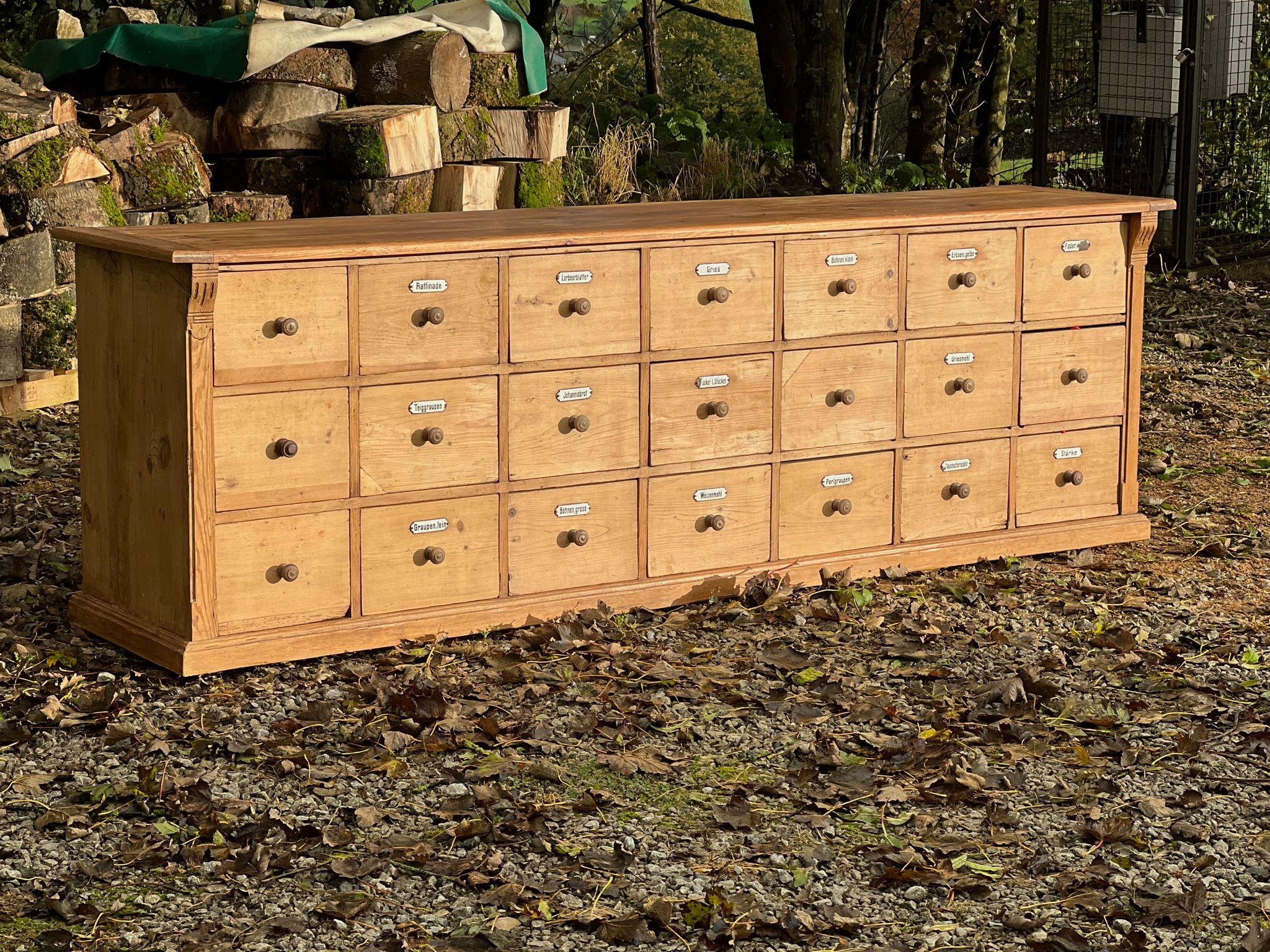 Long German chest of drawers, counter desk in pine 21 drawers 1