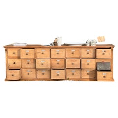 Long German chest of drawers, counter desk in pine 21 drawers