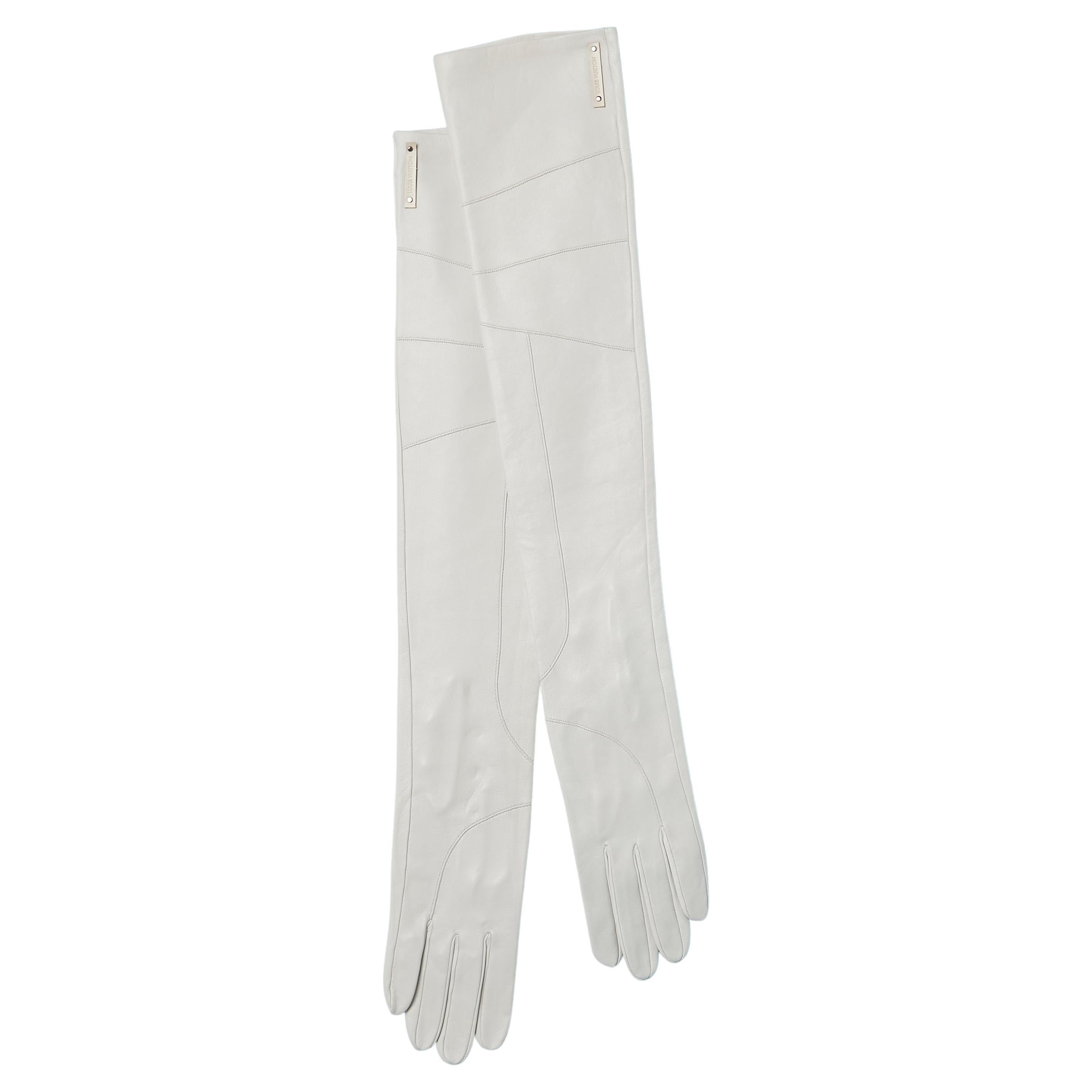 Long gloves in off-white leather with buttons and leather brand Louis Vuitton 
