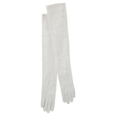Long gloves in off-white leather with buttons and leather brand Louis Vuitton