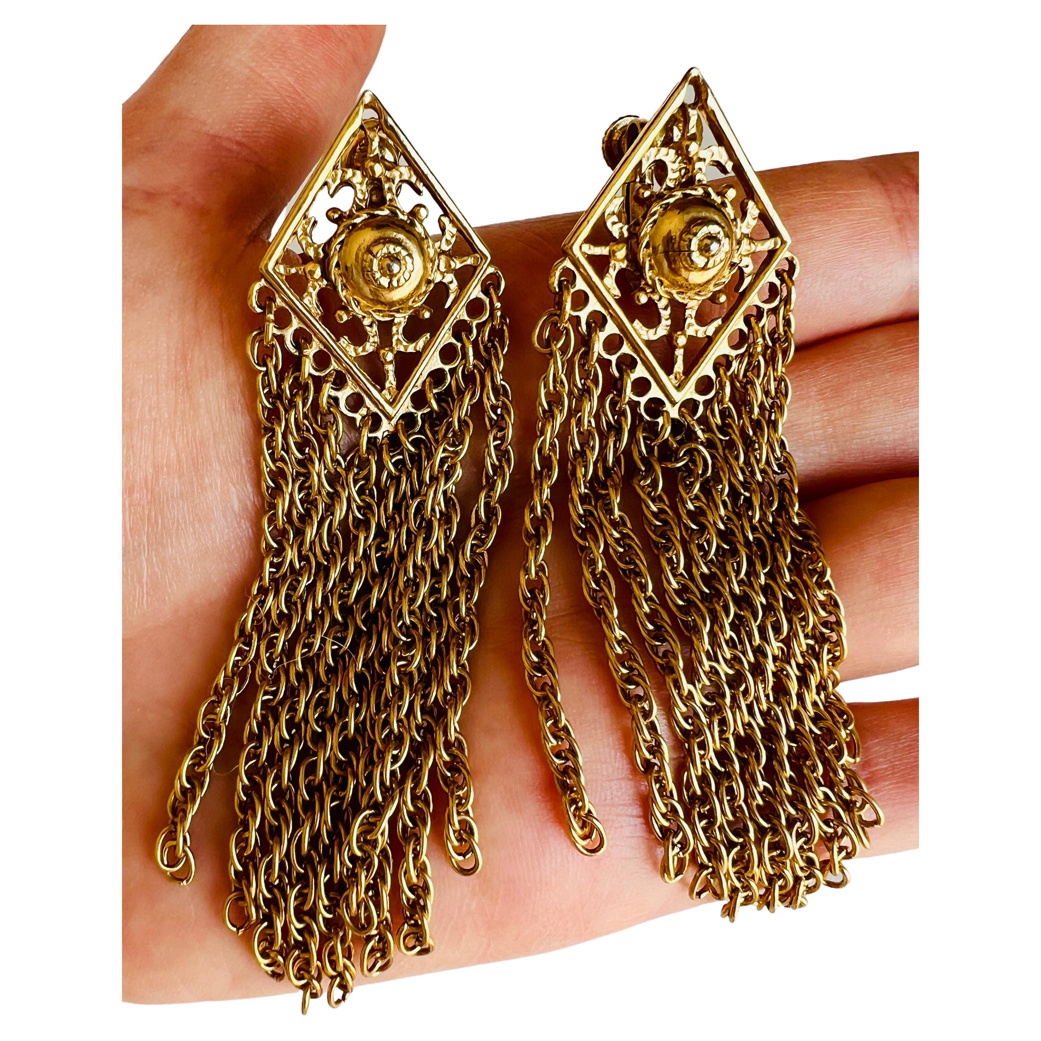 Stylish pair of gold plated chain tassel dangle earrings with adjustable clip backs. 

Size: Slight difference in length (1/4