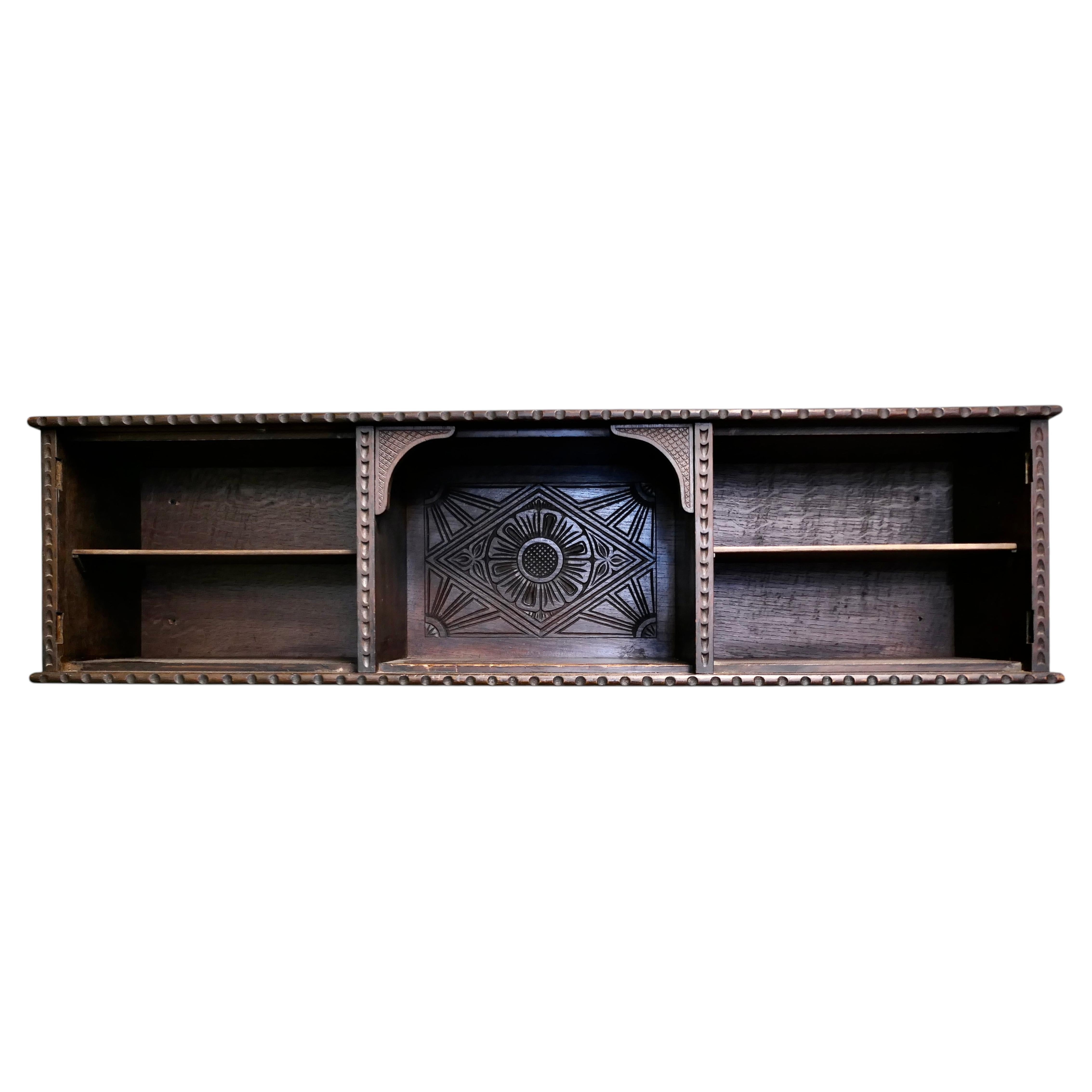 Long Gothic Carved Oak Wall Shelf with storage
