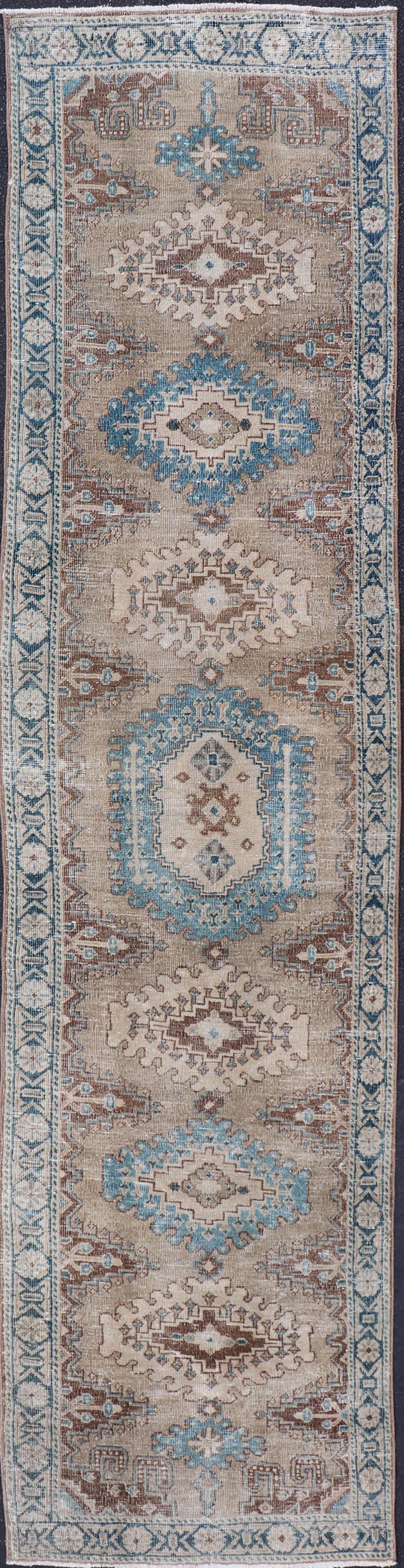 Long Hand-Knotted Antique Heriz Runner in Wool with Sub-Geometric Medallions For Sale