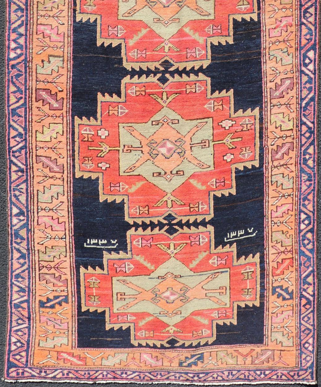 20th Century Long Hand-Knotted Antique Persian Azerbaijan Runner in Wool with Medallions For Sale
