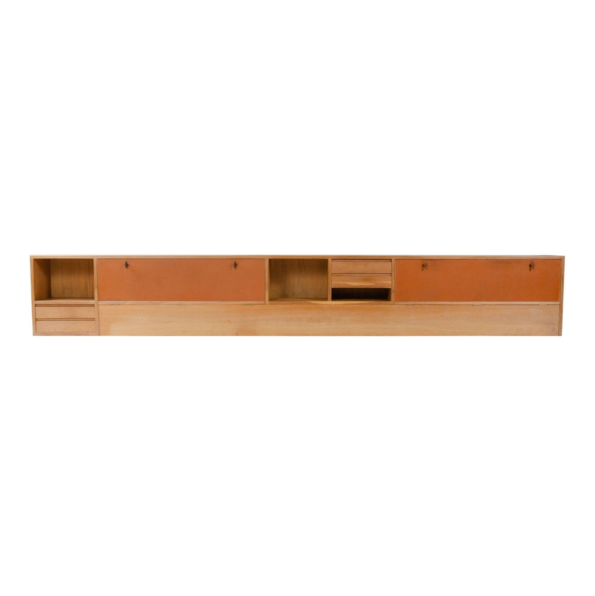 A long wall mount integrated cabinet.