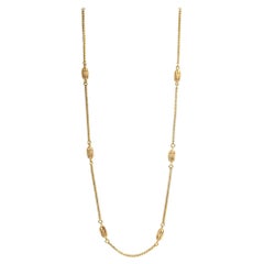 Long Intertwined Textured Leaf Gold Station Necklace