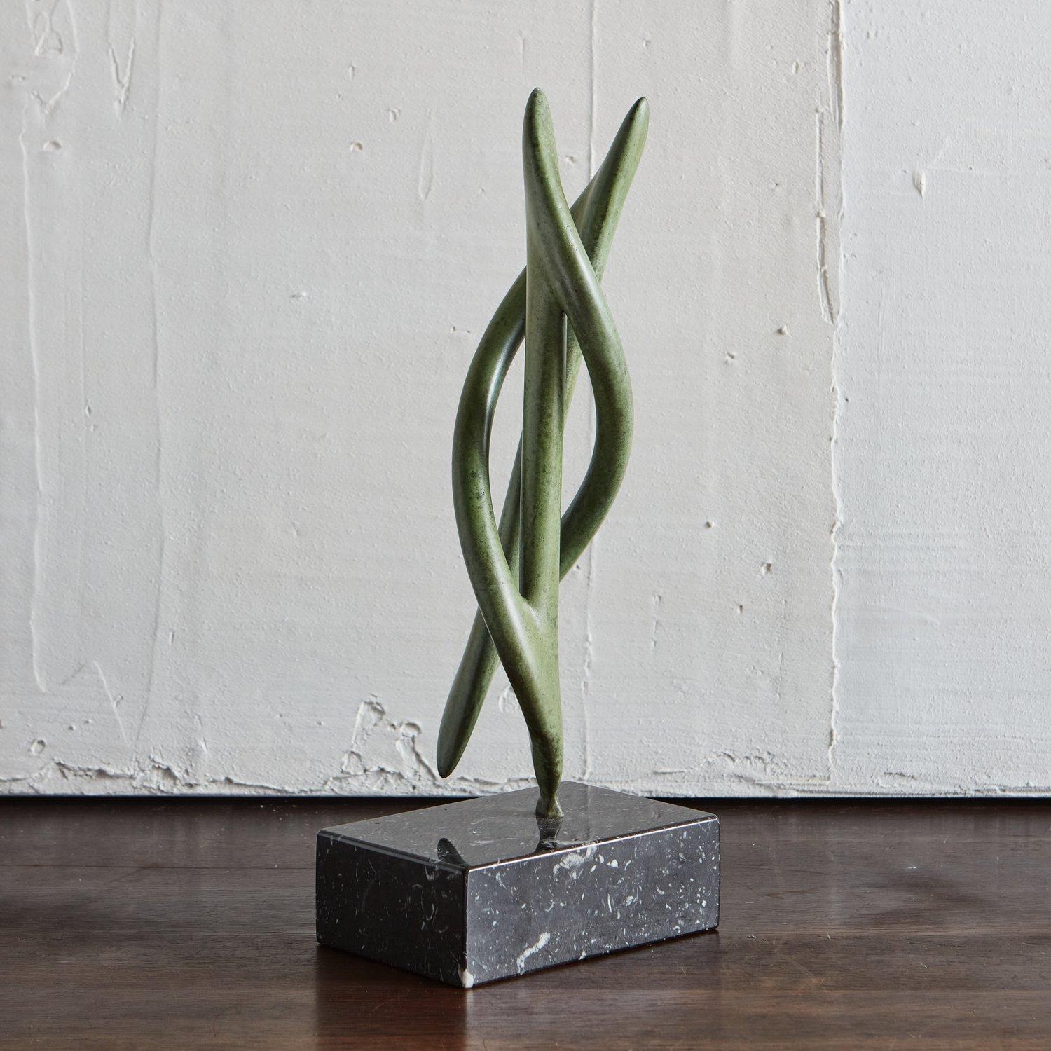 The long Knot Twist sculpture by Chicago artist Karl Geckler. Featured here in a Verde Olivia Finish and mounted on a polished black granite base.

This piece is available standard in a Satin Bronze Finish for $3,120, with a Polished Black Granite