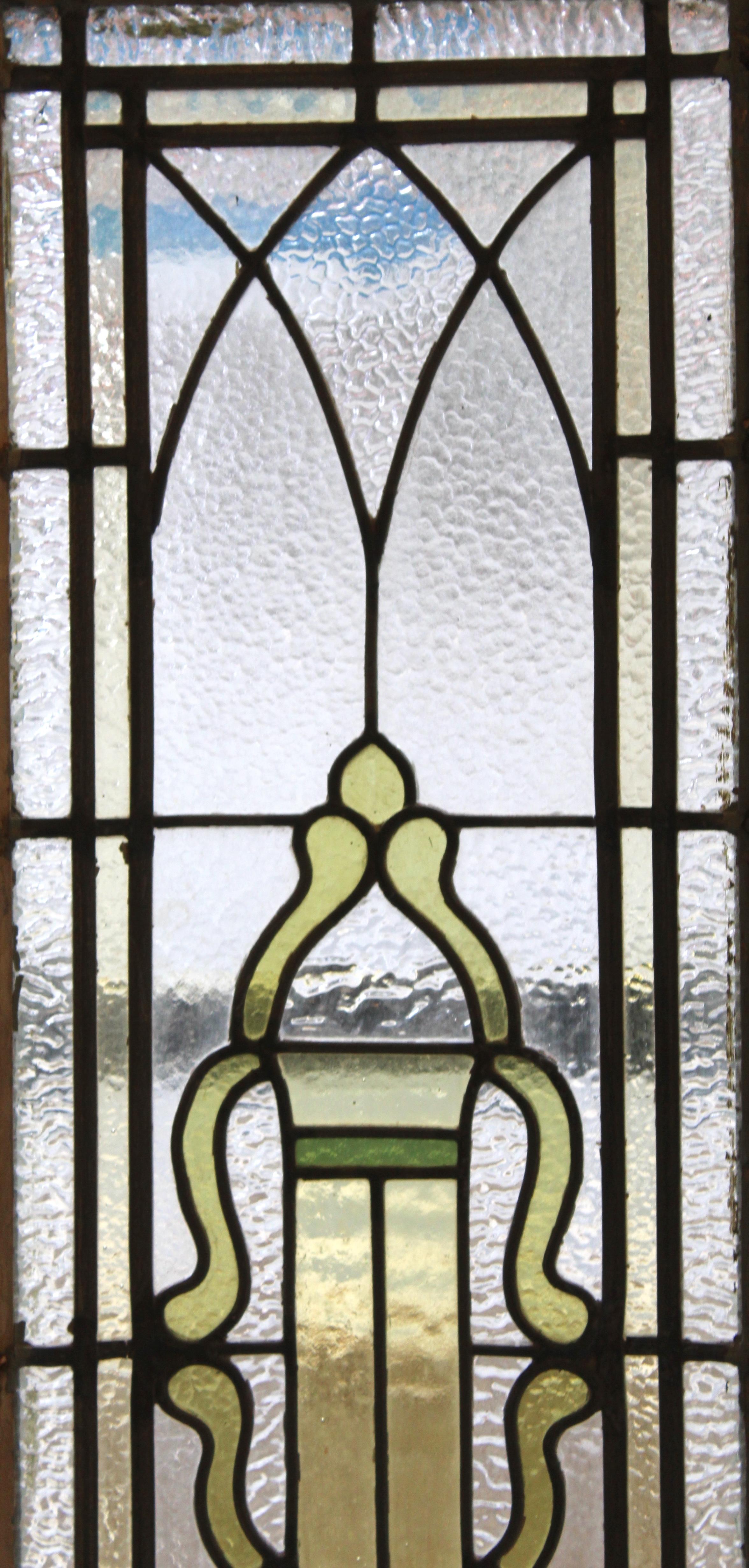 Long five foot leaded glass window or transom. Textured clear glass give light and privacy. Attractive leaded design with shield.
Currently housed in a wooden frame - the overall dimensions are for the stained glass and the frame.
Located in NY

