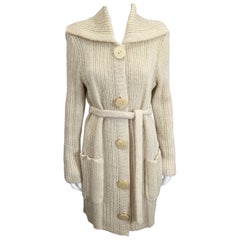 Cardigan in lana a coste dalla linea lunga