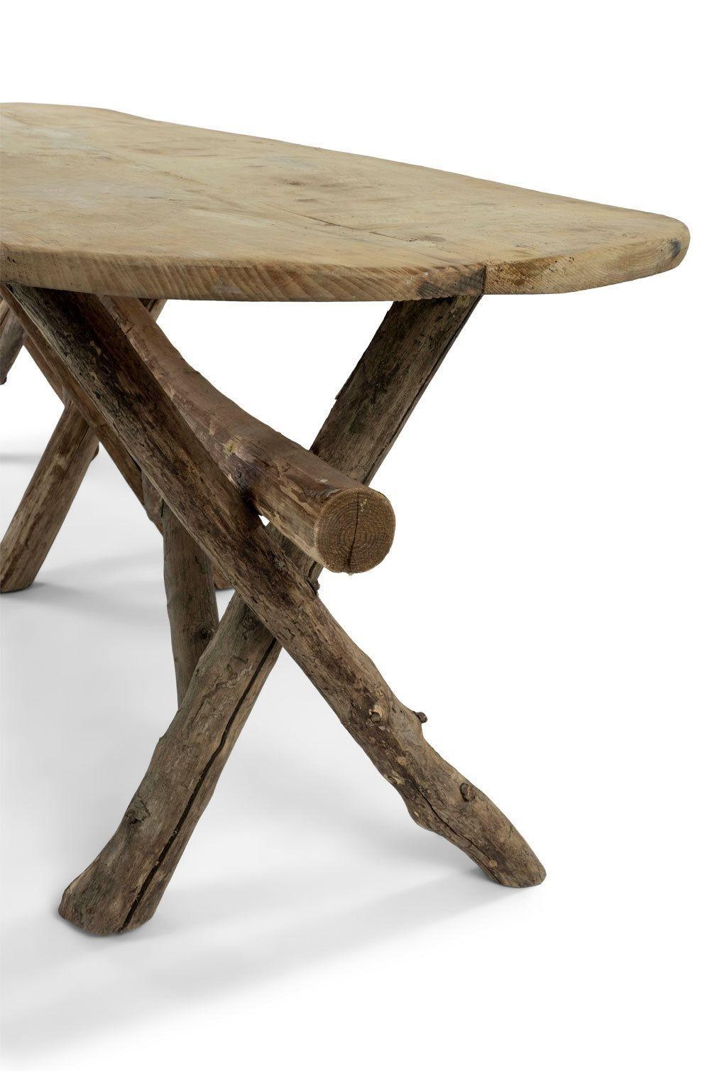 Rustic Long Live-Edge Oval Top Table with Natural Shaped Trestle Base For Sale