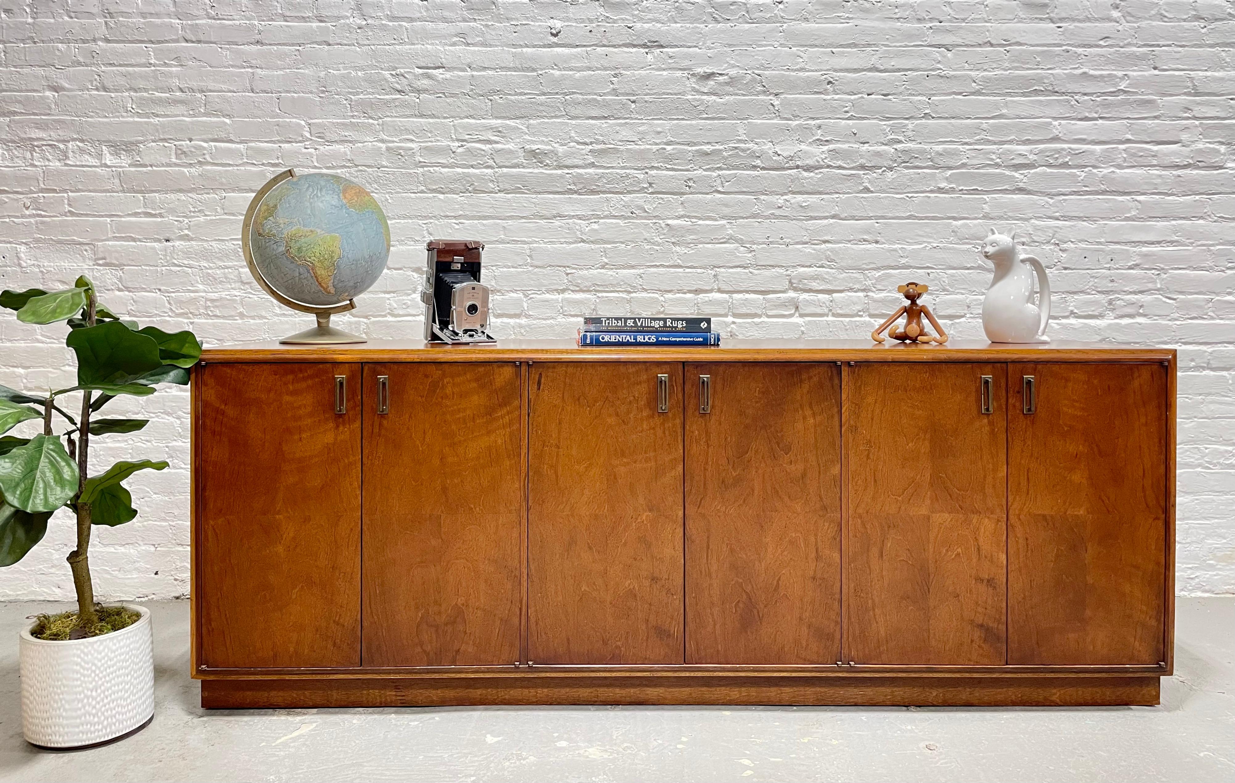 Long + Magnificent Mid Century Modern Walnut Credenza / Media Stand by Founders featuring the most incredible parquet wood pattern design.  The incredible wood grains repeat along the sides and top of this piece and it will easily brighten any room.