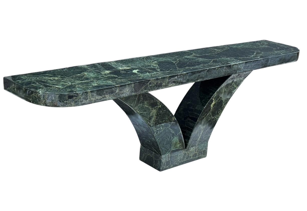 Imported from Mexico in the late 1970's. Beautiful rich looking green Onyx veneer on wood construction. 

This has seen little use, and is in very good condition. 

Comes in two pieces for easier handling and installations. 
