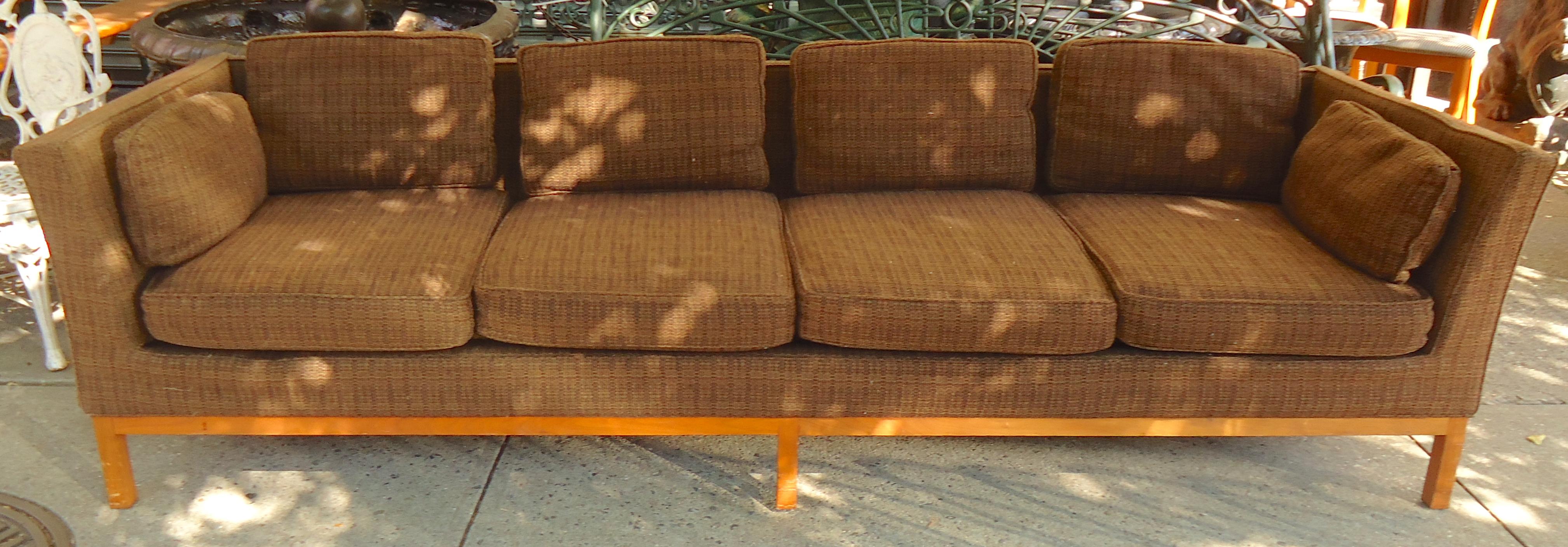 Four seat midcentury sofa with wood base. Simple and elegant design.
(Please confirm item location - NY or NJ - with dealer).
  
