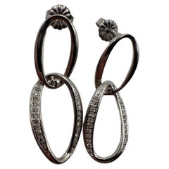 Long modern diamond earrings 14KT gold