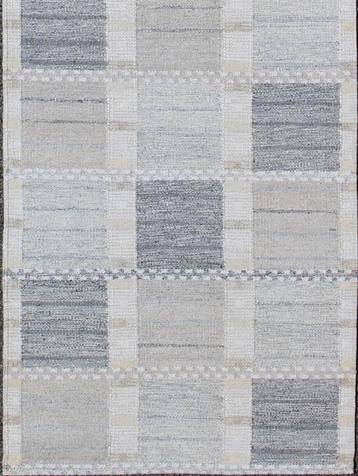 Long modern geometric runner in grey, cream, ivory, and faint taupe, rug rjk-16048-shb-022-04, country of origin / type: Western Europe / Scandinavian, 2018

This Scandinavian patterned rug is inspired by the work of Swedish textile designers of