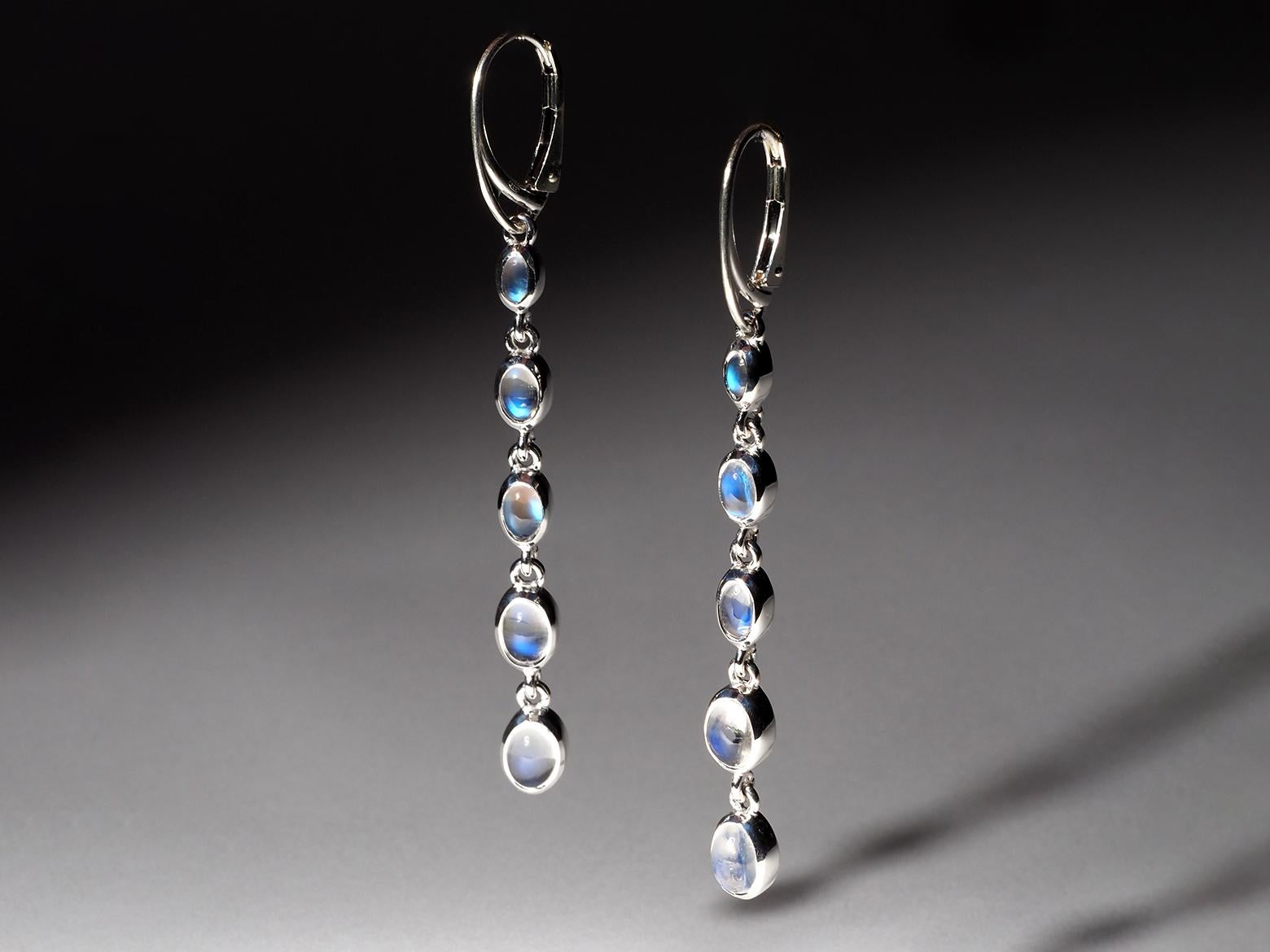 Long silver earrings with natural Moonstones 
10 oval-cut Moonstones, gemstone origin - India
earrings weight - 7 grams
earrings length - 1.73 in / 72 mm
gem size is from 0.12 x 0.20 to 0.20 x 0.26 in / 3 x 5 mm to 5 x 7  mm