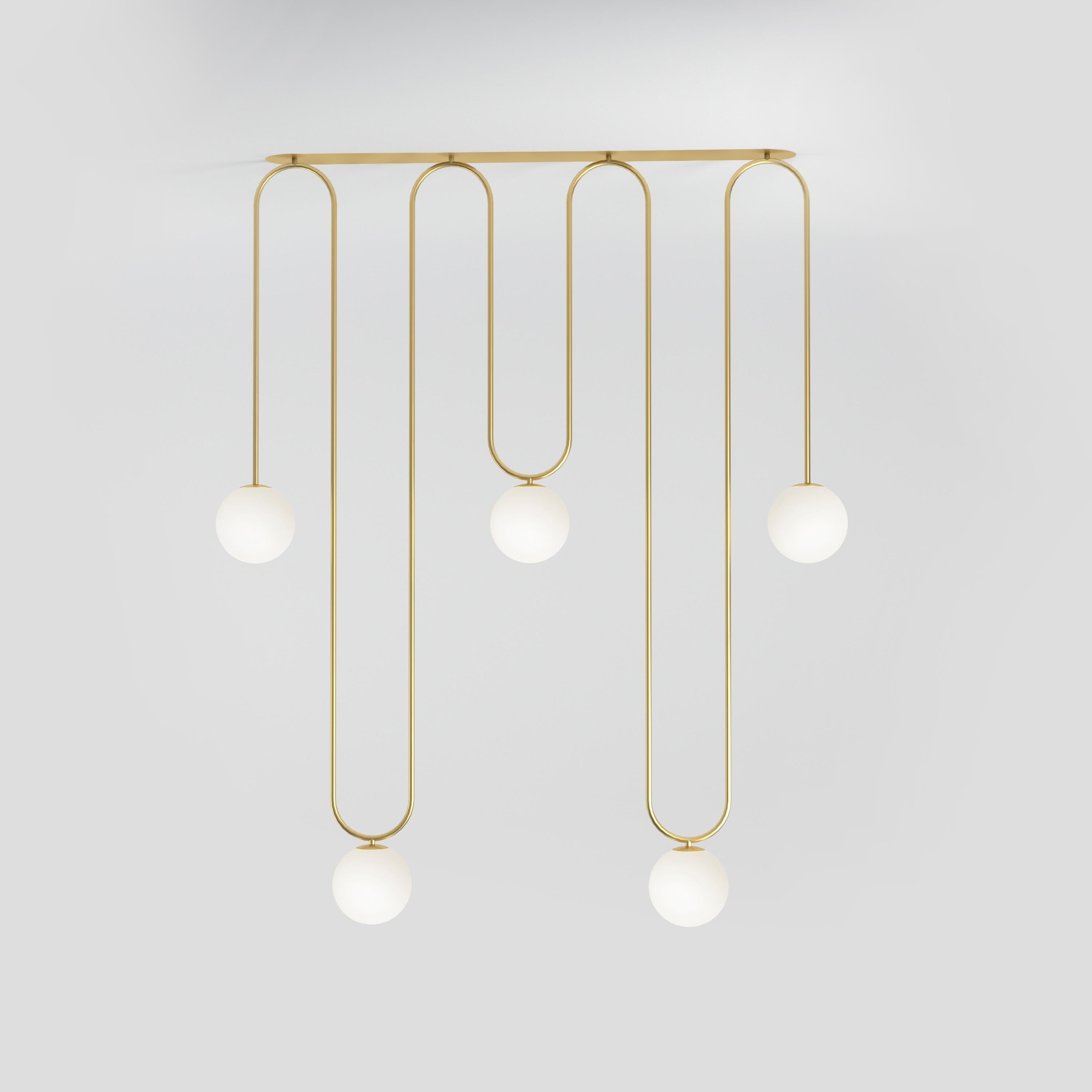Long Motive Brass Ceiling Light by Atelier Areti
Dimensions: D 13.5 x W 94.5 x H 131.4 cm.
Materials: Brushed brass, white glass.

Available in white, black, color, or brass.

All our lamps can be wired according to each country. If sold to the USA