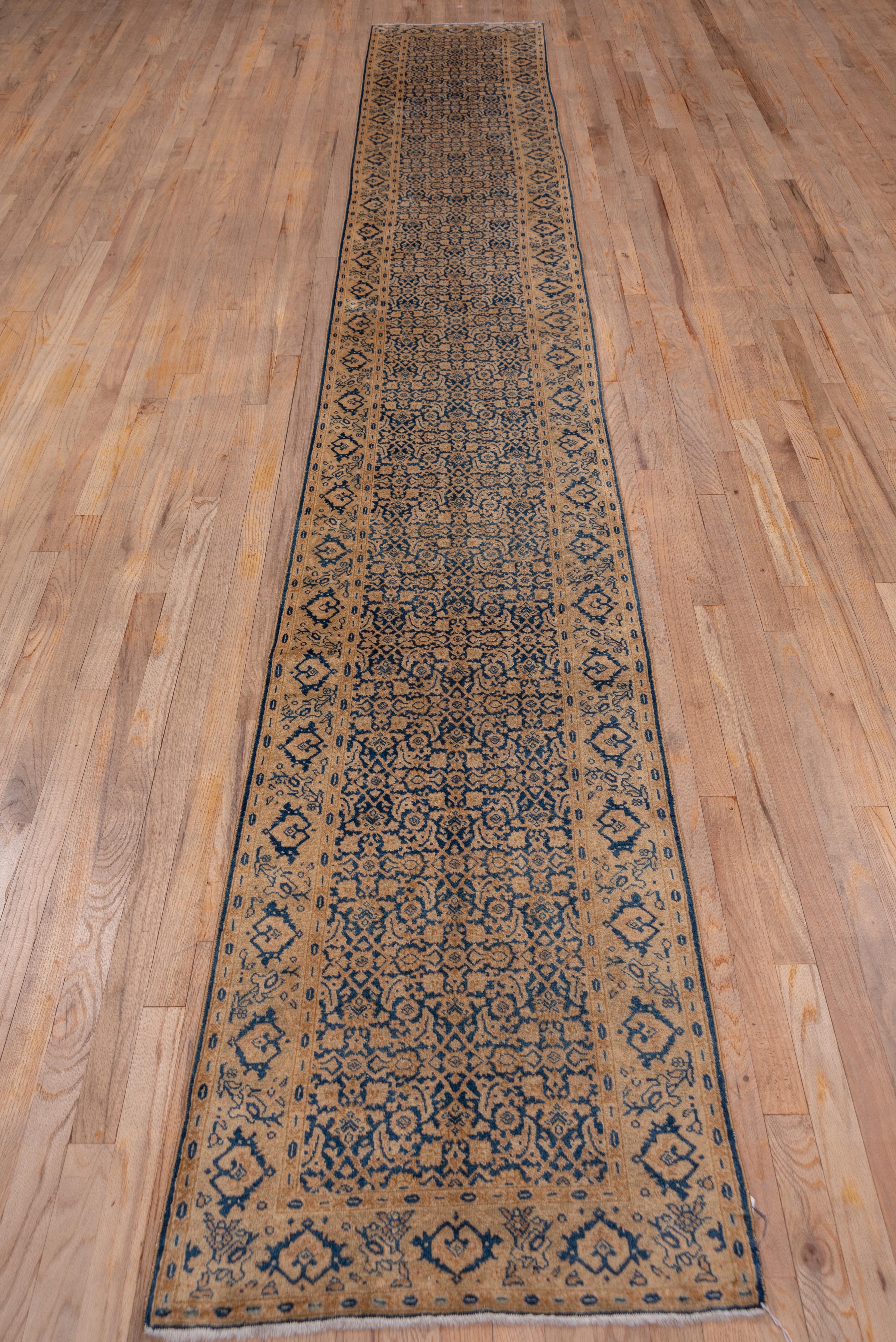 Hand-Knotted Long and Narrow Antique Persian Tabriz Runner, Blue and Gold Tones, circa 1920s For Sale