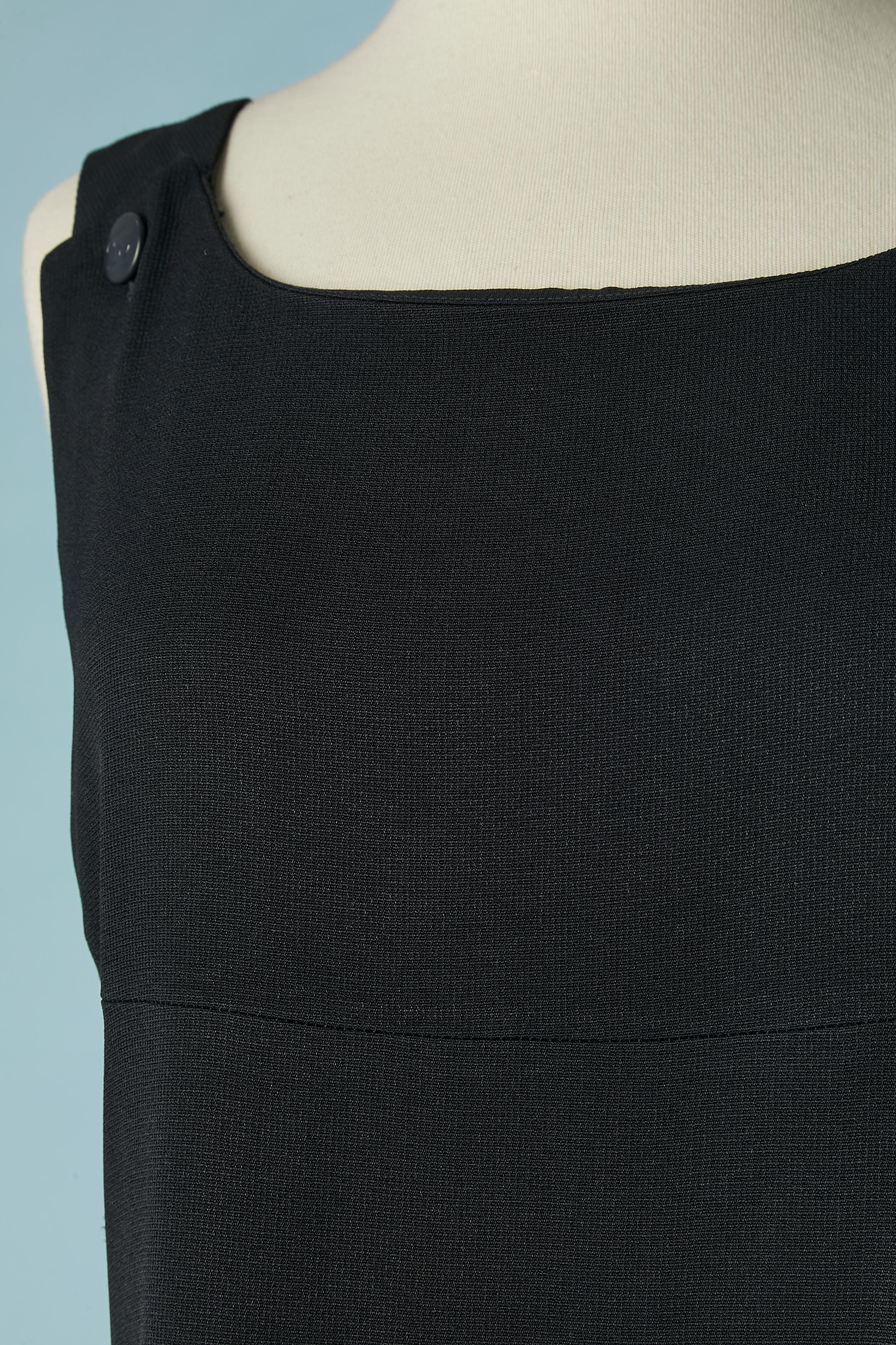 Long navy blue dress with branded button. 
Main fabric composition: 51% rayon, 49% acetate. Silk branded lining. 2 buttons in the front and 2 buttons and buttonhole on the back. Hidden zip in the middle back. 
SIZE 40 (Fr) 
