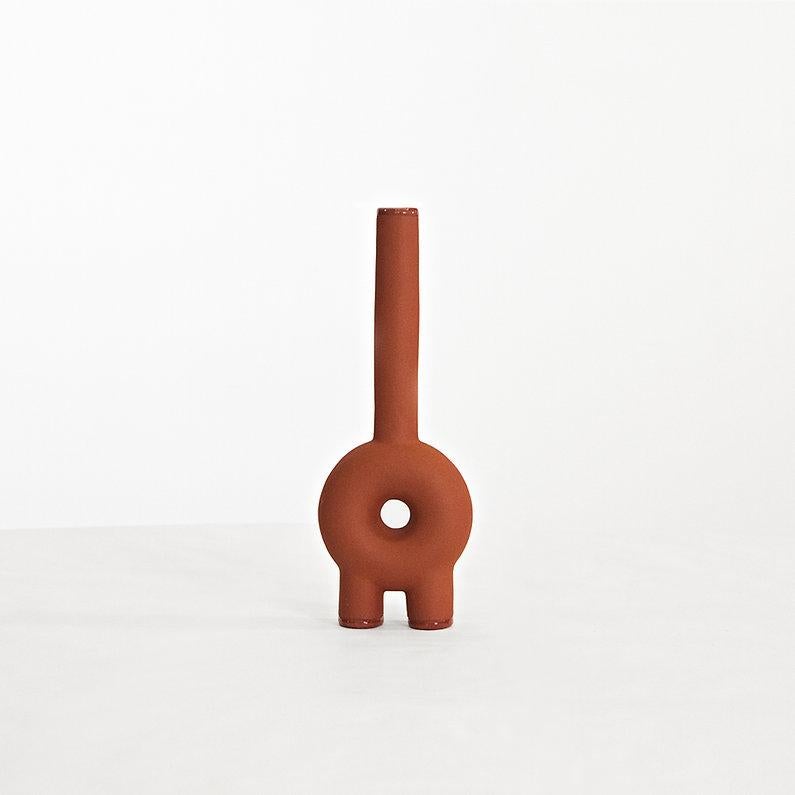Long neck ceramic vase by Faina.
Design: Victoriya Yakusha.
Materials: ceramic.
Dimensions: L 10 x W 5 x H 38 cm.

In search of new-old design messages, Victoria Yakusha conducted a study of the daily traditions of our ancestors. The times of