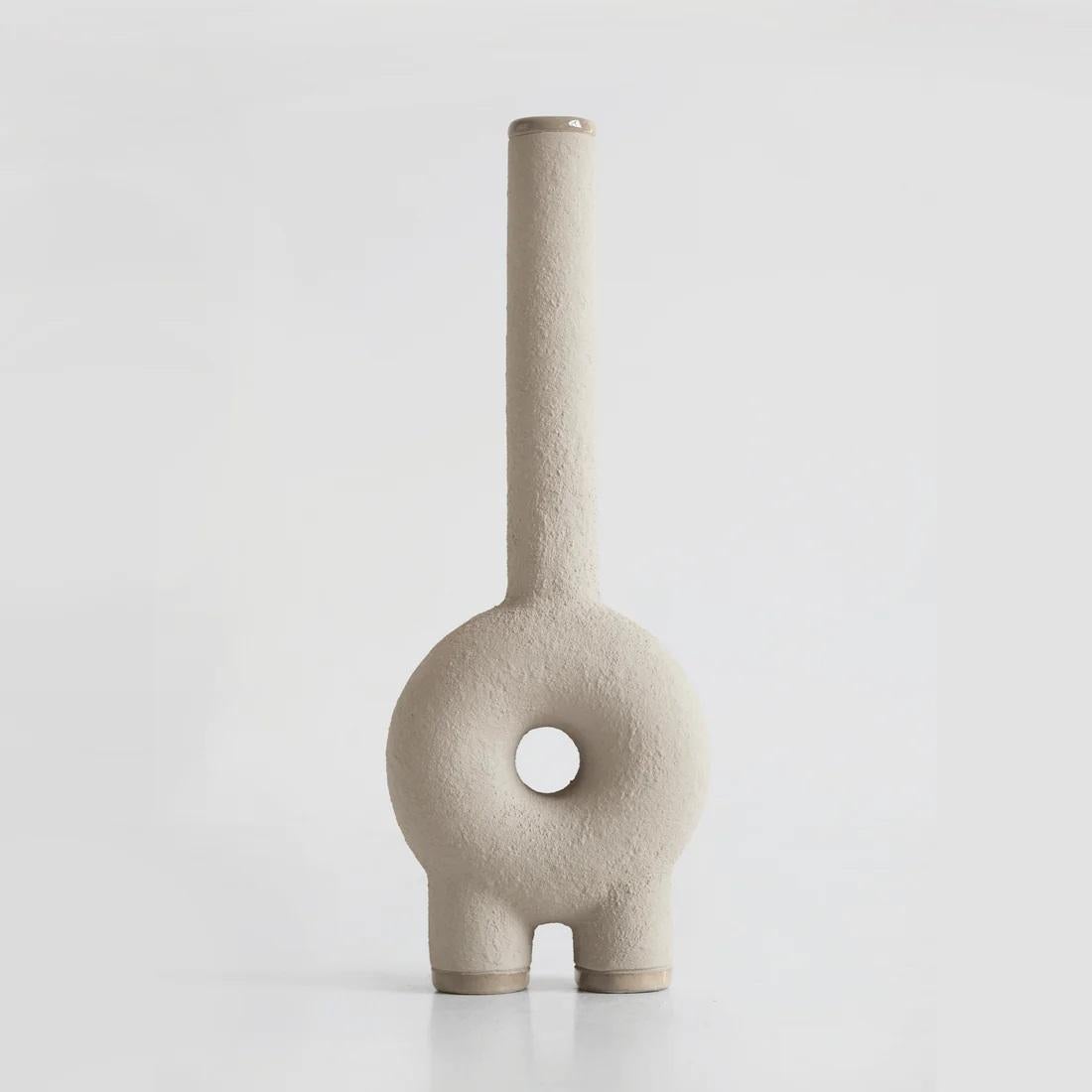 Long neck ceramic vase by Faina
Design: Victoriya Yakusha
Materials: ceramic.
Dimensions: L 10 x W 5 x H 38 cm

In search of new-old design messages, Victoria Yakusha conducted a study of the daily traditions of our ancestors. The times of