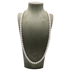 Long collier perles en or blanc 18 carats de 9-10 mm