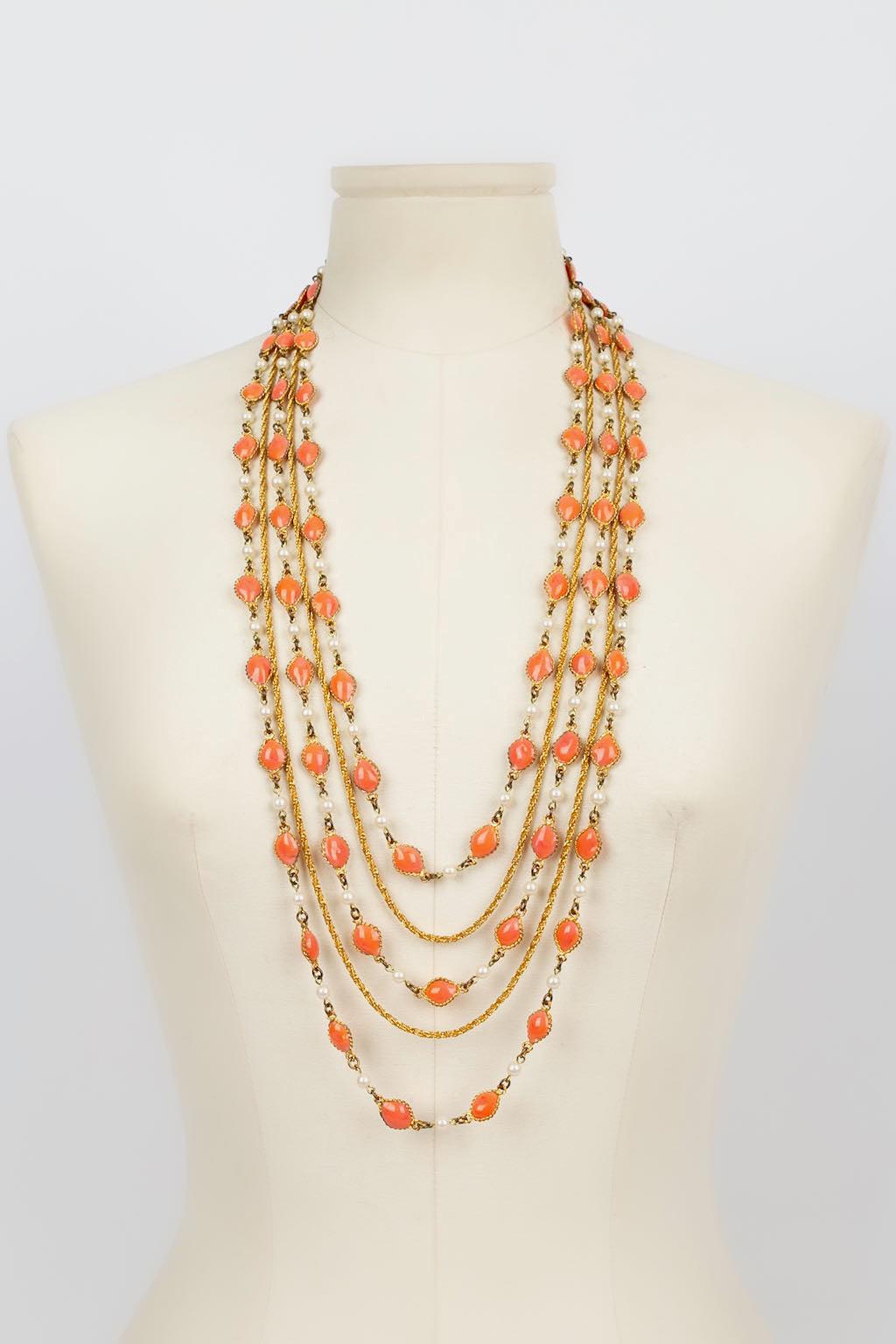 Long necklace made of gold metal, glass paste and pearly beads.

Additional information: 
Dimensions: Length : 72 cm
Condition: Very good condition
Seller Ref number: BC280