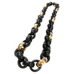 Collier long avec maillons ronds en or rose 18 carats et ébène