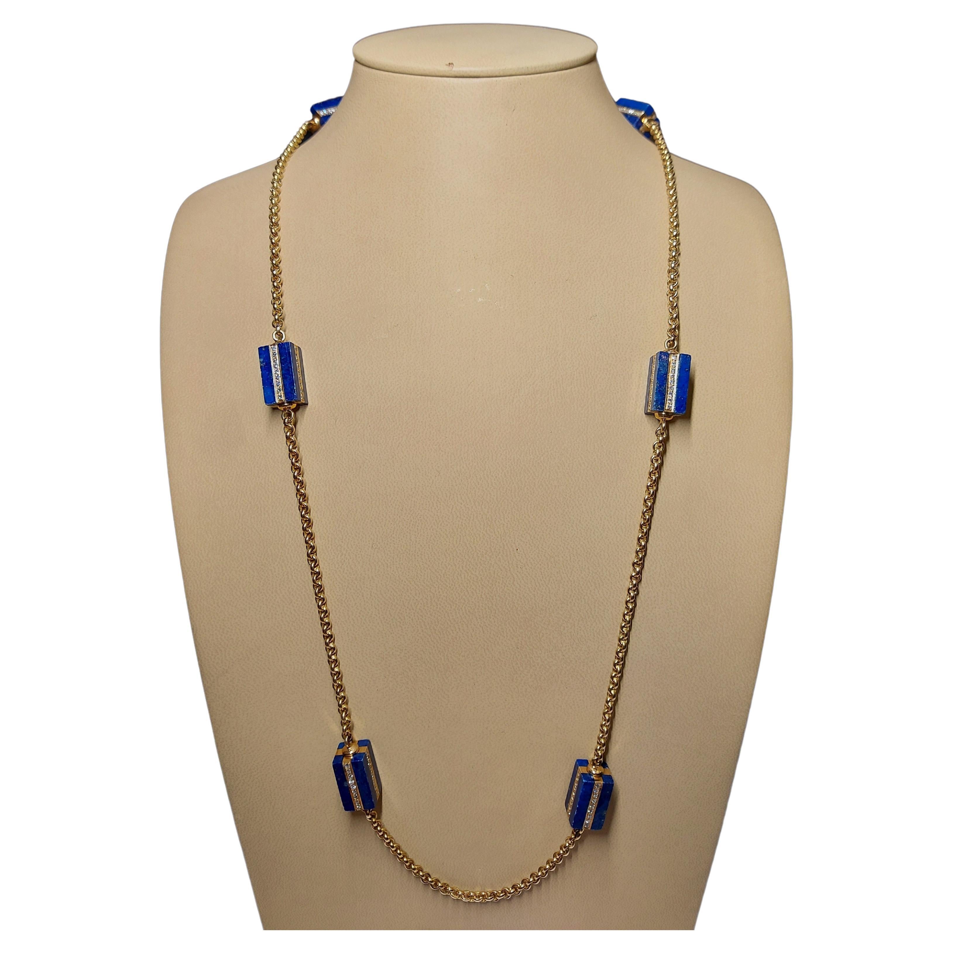 Magnificent Long Necklace with Lapis Lazuli and Diamonds, Estate His Majesty The Sultan Of Oman Qaboos Bin Said

Stone: Rectangle lapis lazuli stone, 19 mm x 10.08 mm x 10.08 mm

Diamonds: 216 diamonds together 4.32ct

Material: 18kt Yellow