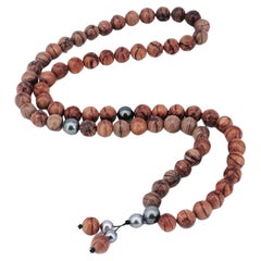 Collier long avec grandes perles de Tahiti et perles de bois de rose pour hommes