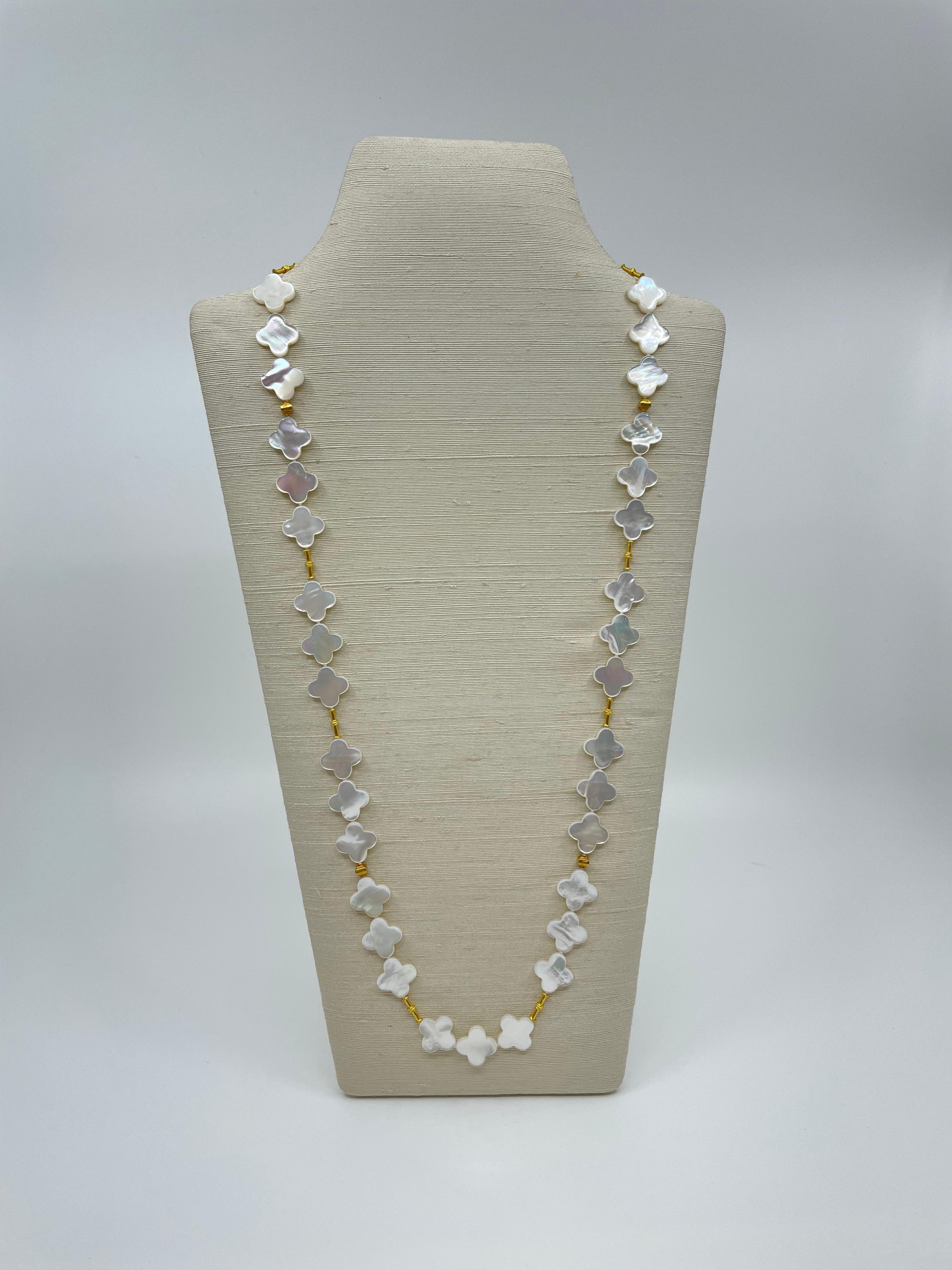 From our Amalfi collection, an exquisite hand-made long necklace with mother-of-pearl quatrefoil beads, spaced by 18K gold faceted and tube-shaped beads, stunning for all occasions in spring and summer.

The Amalfi Collection
Evoking the wonderful