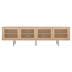 Long oak sideboard TV stand with slatted doors in mid century modern style