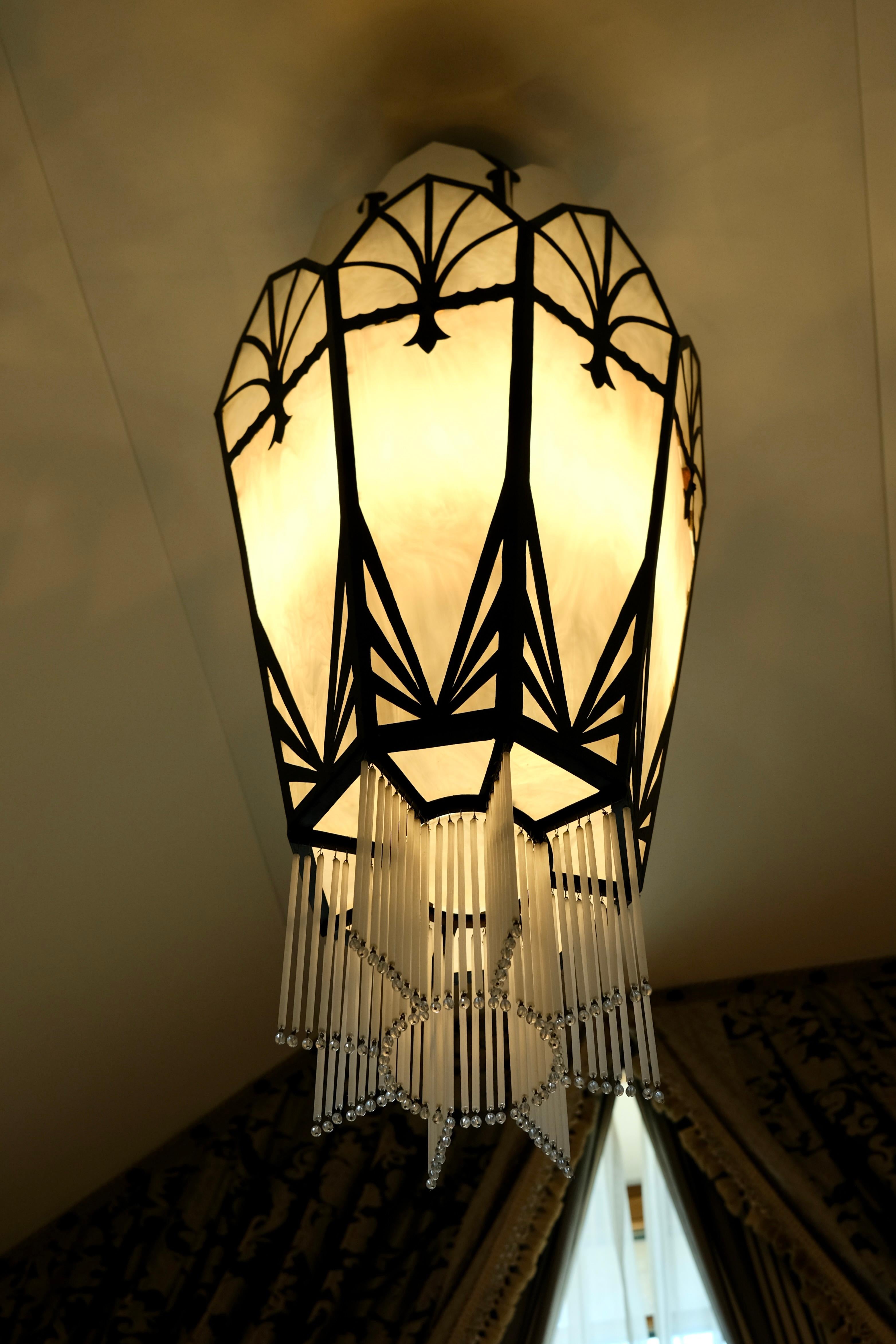 20th Century Long Octagonal Art Deco Style Chandelier with Glass and Black Metal Mount For Sale