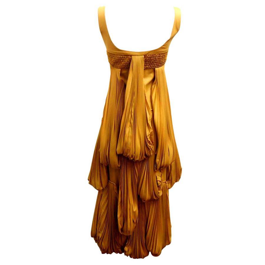 2008 Origami collection Silk plissé Fantastic work of folds and embroidery Yellow ochre color Total lenght (shoulder/hem) cm 132 (51.9 inches) Perfect for gala event or ceremony
