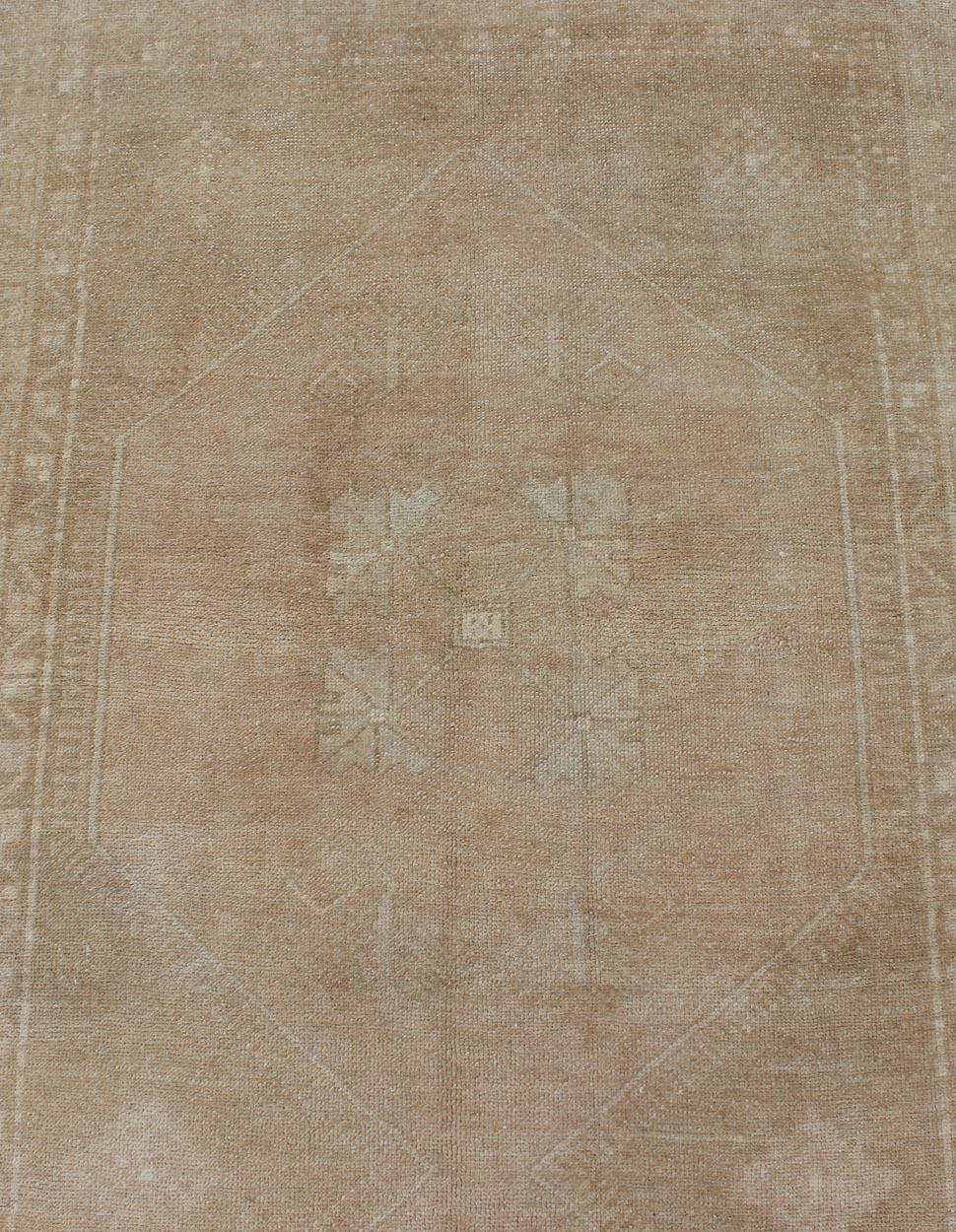 Mid-20th Century Long Oushak Runner with Subdued Design and Neutral Color Palette For Sale