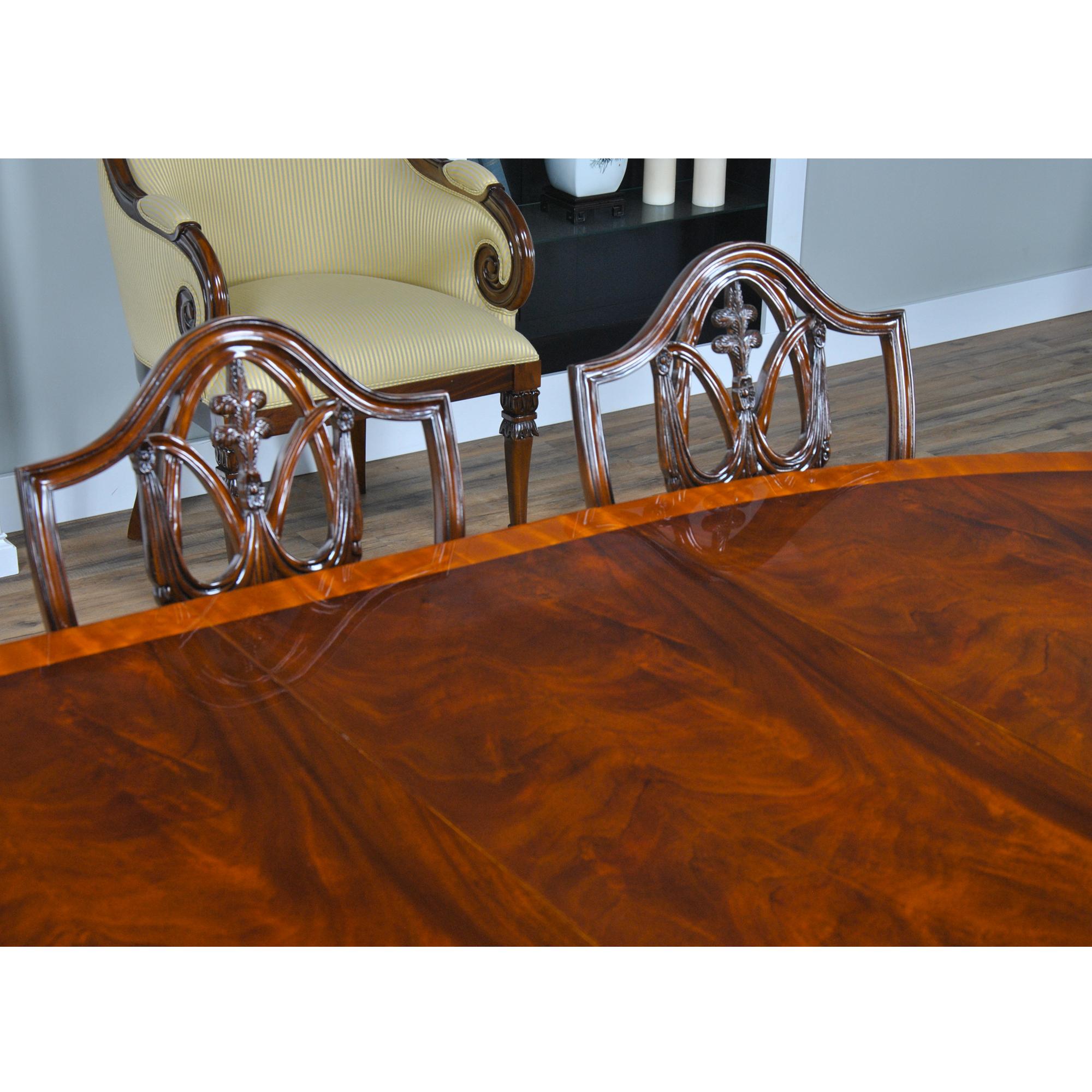 Hand-Carved Long Oval Mahogany Dining Table  For Sale