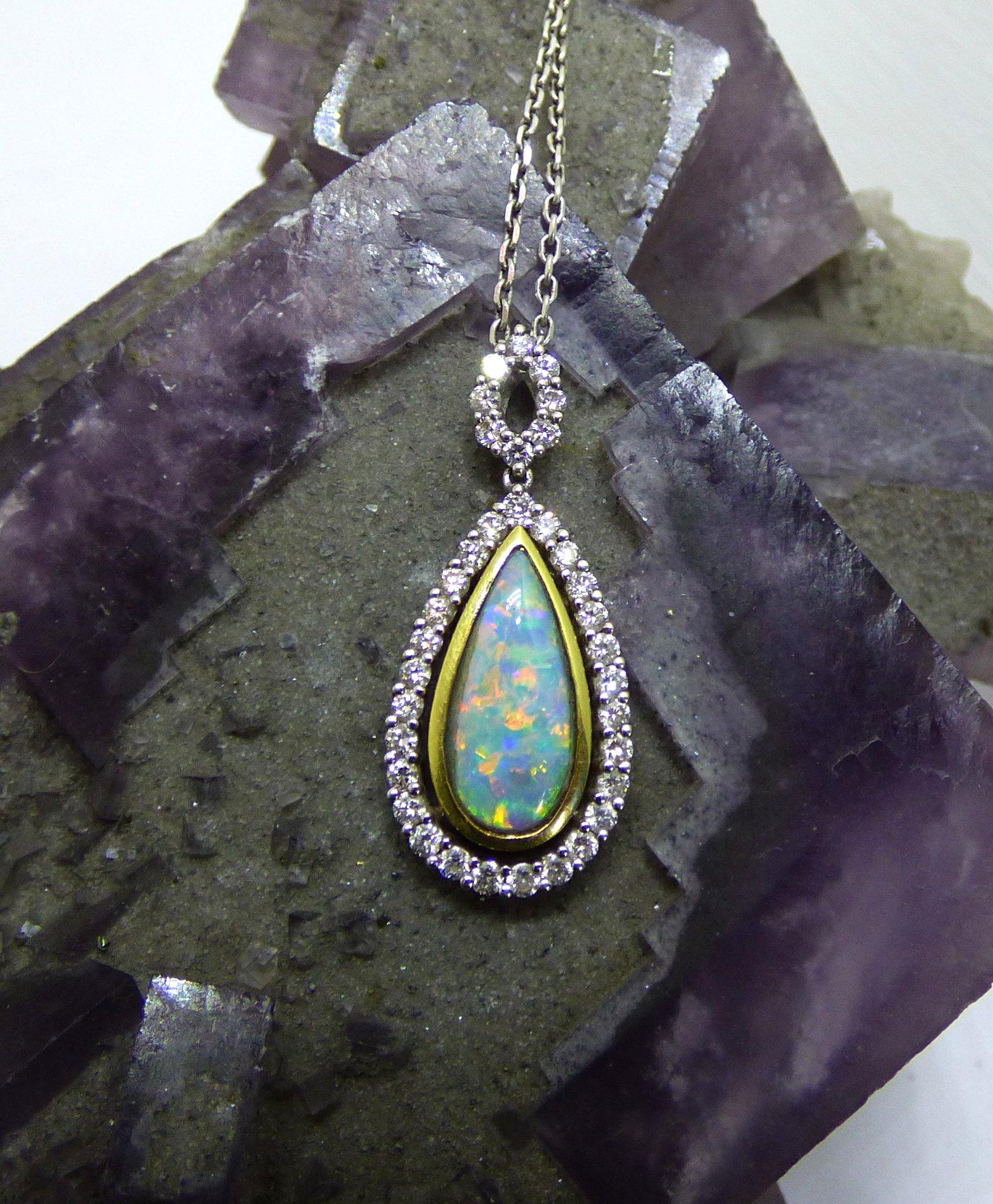 Modern Long pear shaped Opal and Diamond Pendant with 18