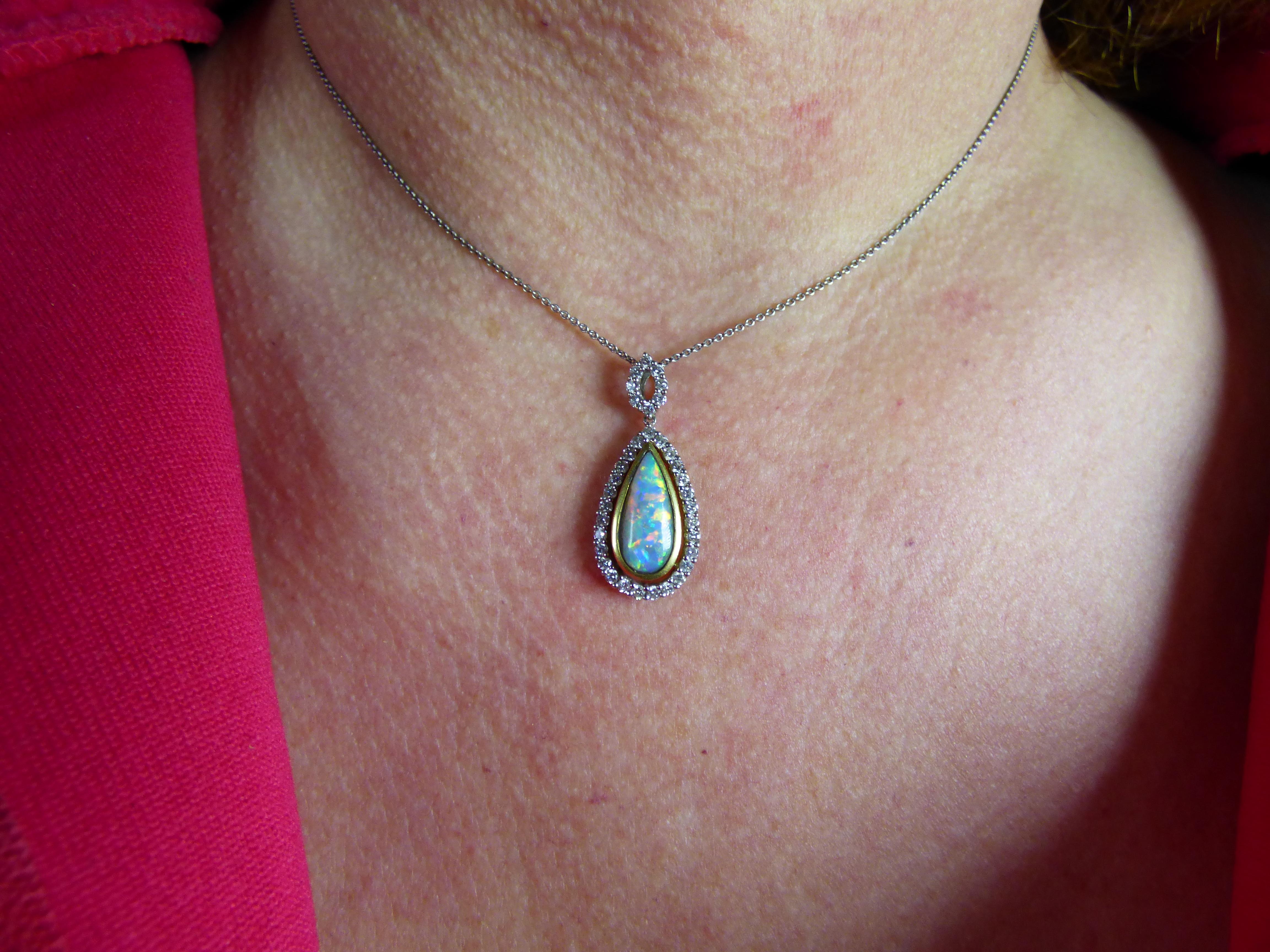 Long pear shaped Opal and Diamond Pendant with 18