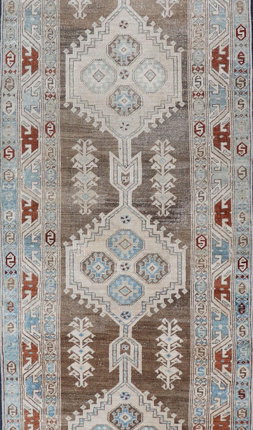 Hand-Knotted Long Persian Heriz Runner with Central Medallions in Brown, Blue, Tan & Red For Sale